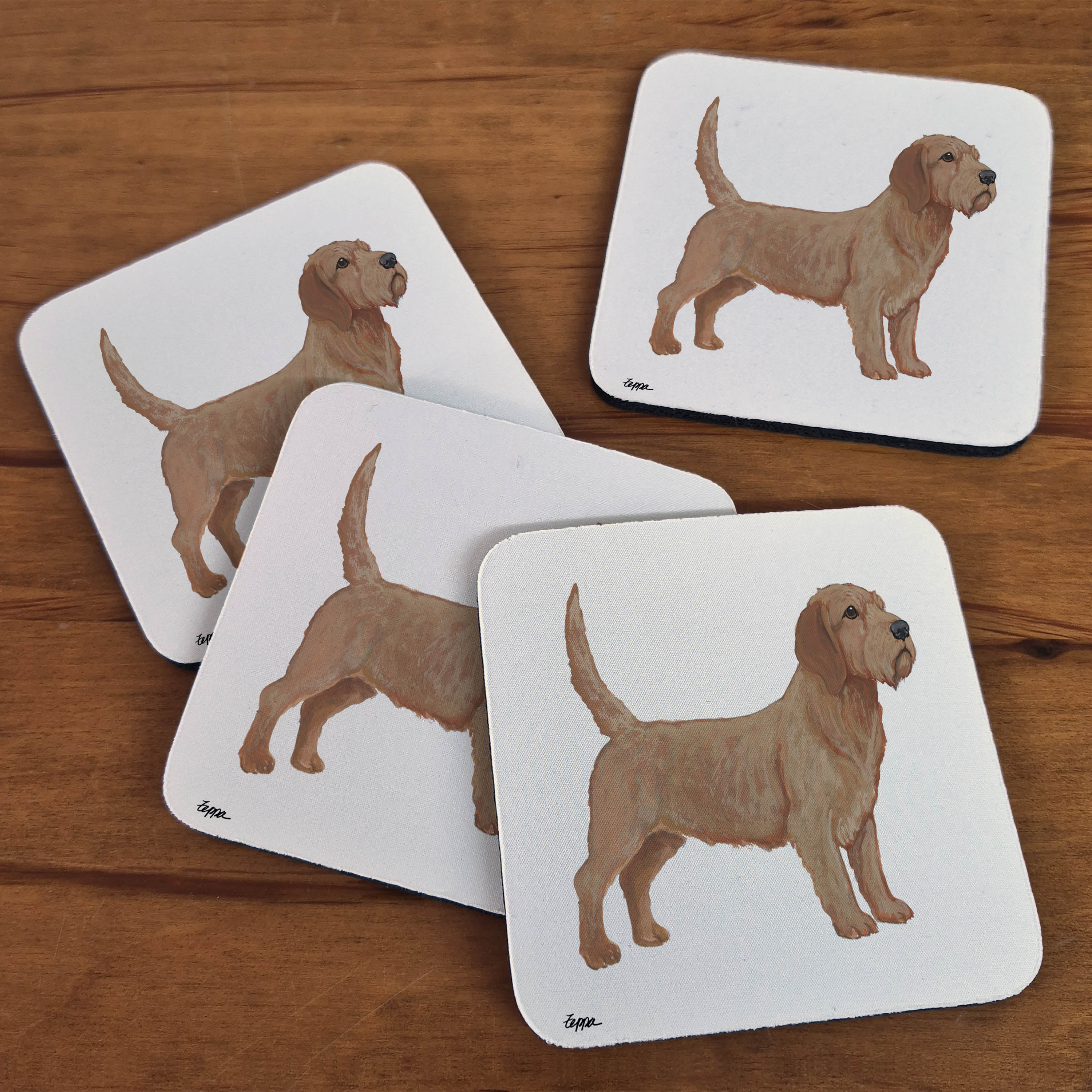 Rubber beverage coasters with a Basset Fauve de Bretagne on a beige background
