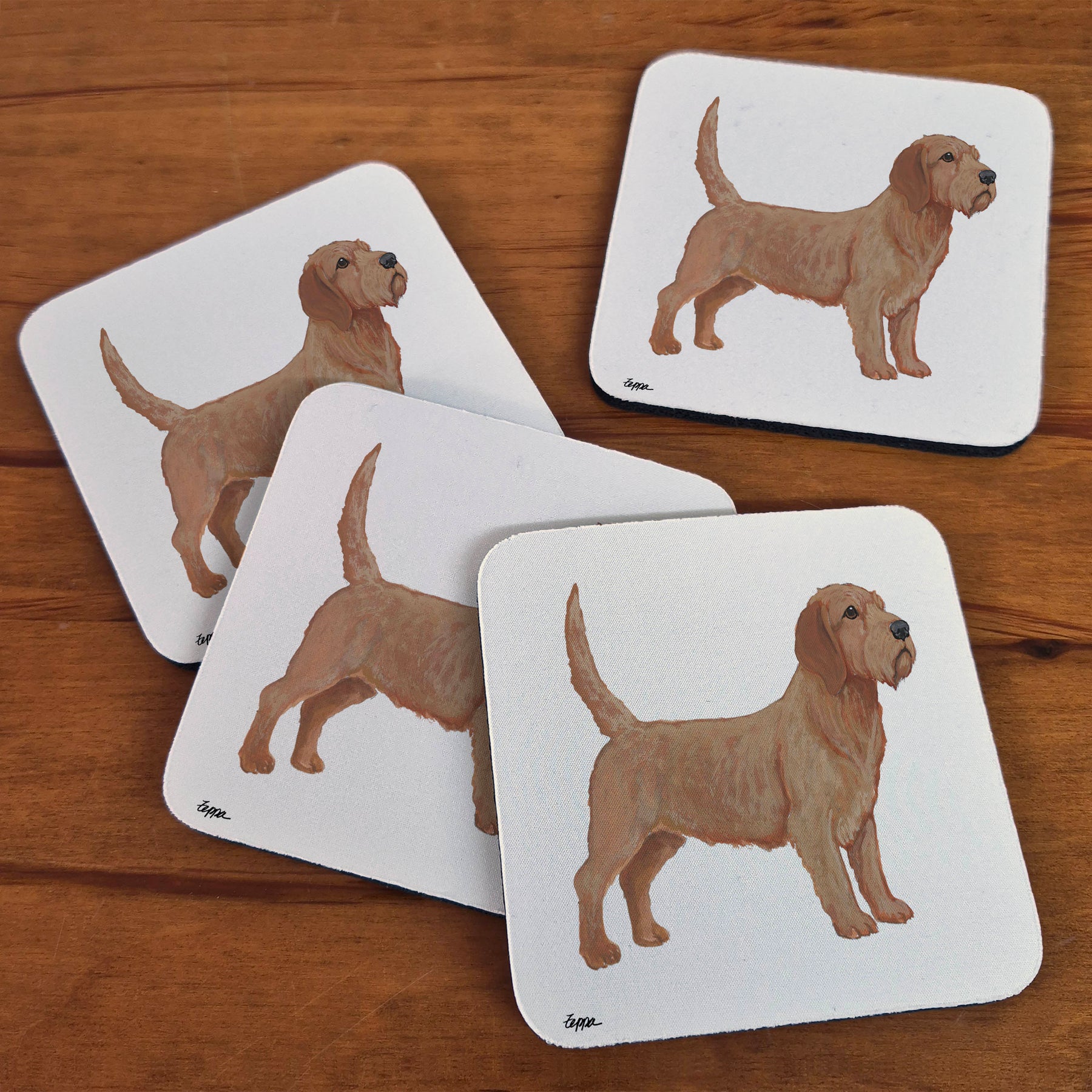 Rubber beverage coasters with a Basset Fauve de Bretagne on a beige background
