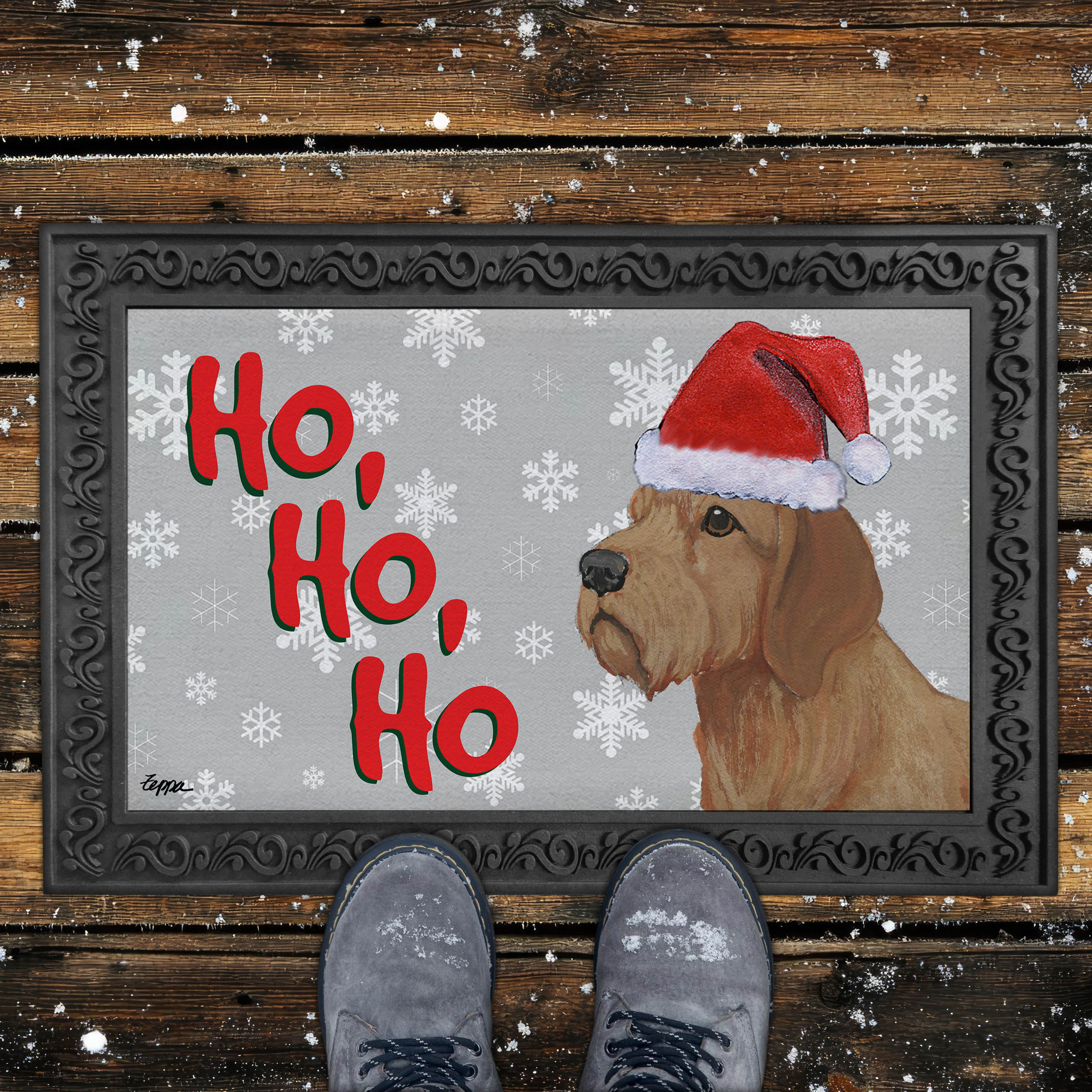 Holiday doormat with a Basset Fauve de Bretagne in a Santa hat on a grey snowflake background