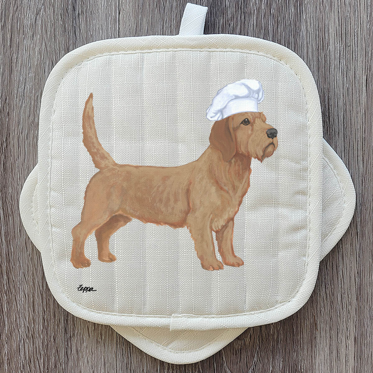 Beige potholder set with a Basset Fauve de Bretagne in a chef's hat.

