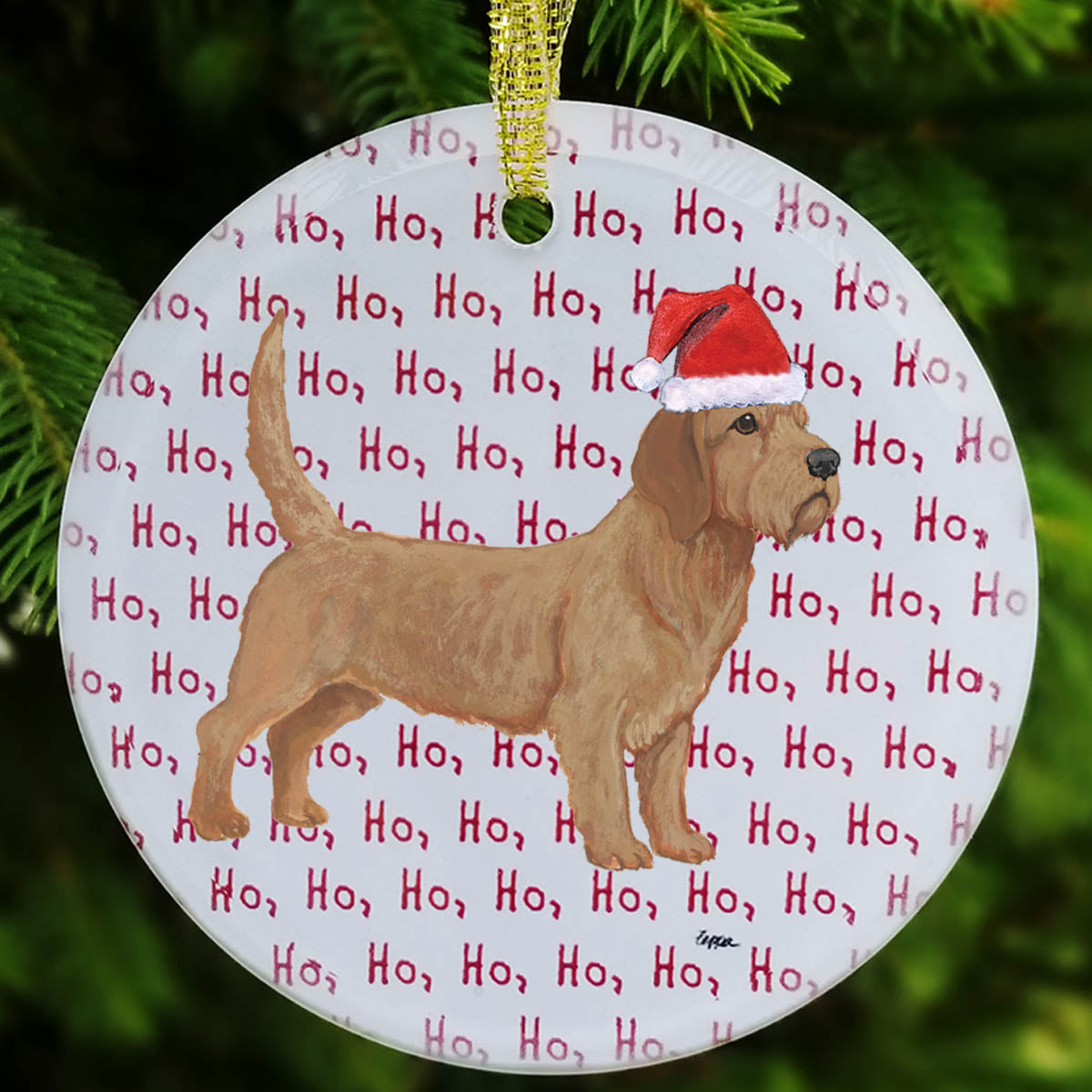 Christmas ornament with a Basset Fauve de Bretagne in a Santa hat on a ho ho ho background