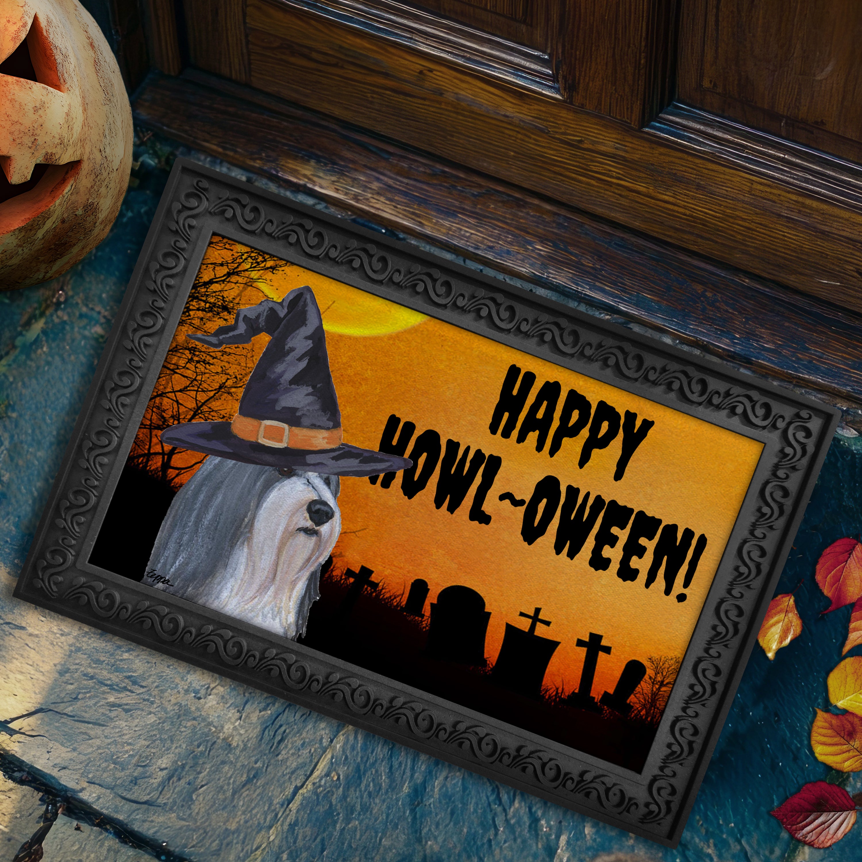 Halloween-themed doormat with a Bearded Collie wearing a witch hat and 'Happy Howl-Oween!' text on a doorstep.