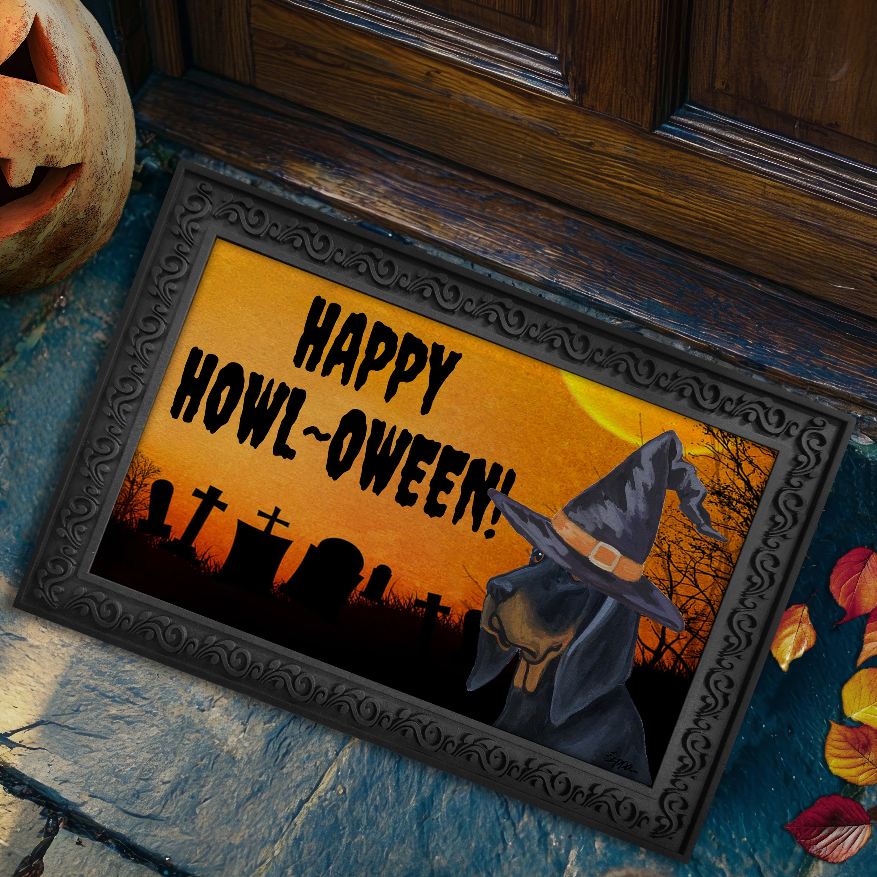 Halloween-themed doormat with a Black and Tan Coonhound wearing a witch hat and 'Happy Howl-Oween!' text on a doorstep.