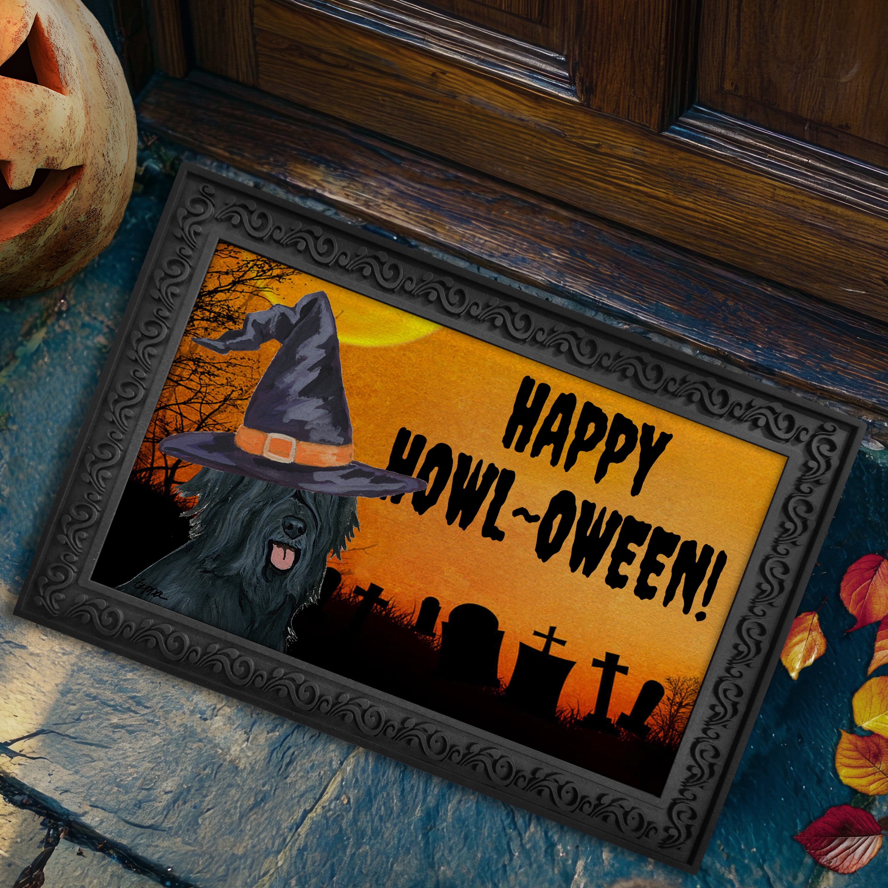 Halloween-themed doormat with a Briard wearing a witch hat and 'Happy Howl-Oween!' text on a doorstep.
