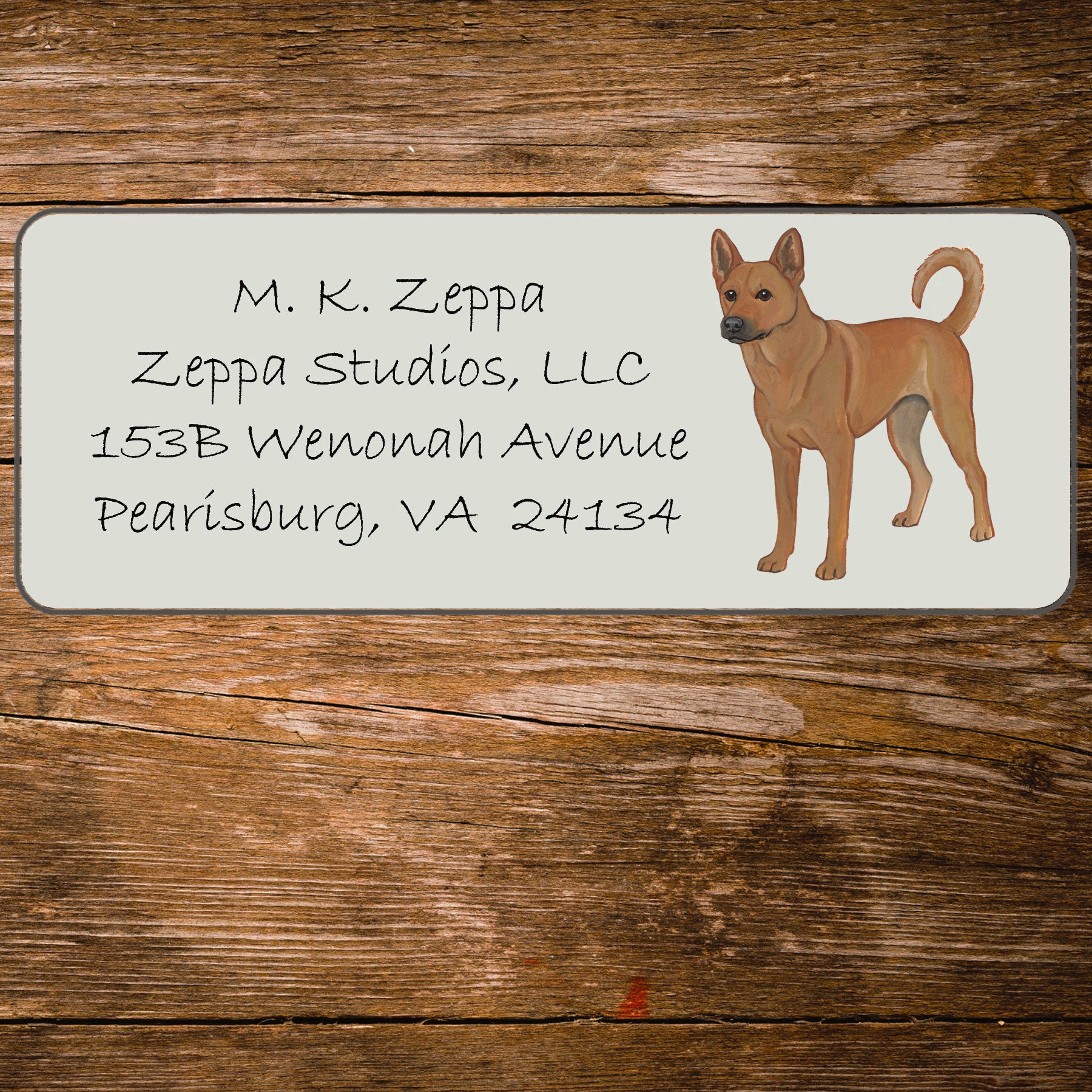 Return address label with a Carolina Dog illustration.