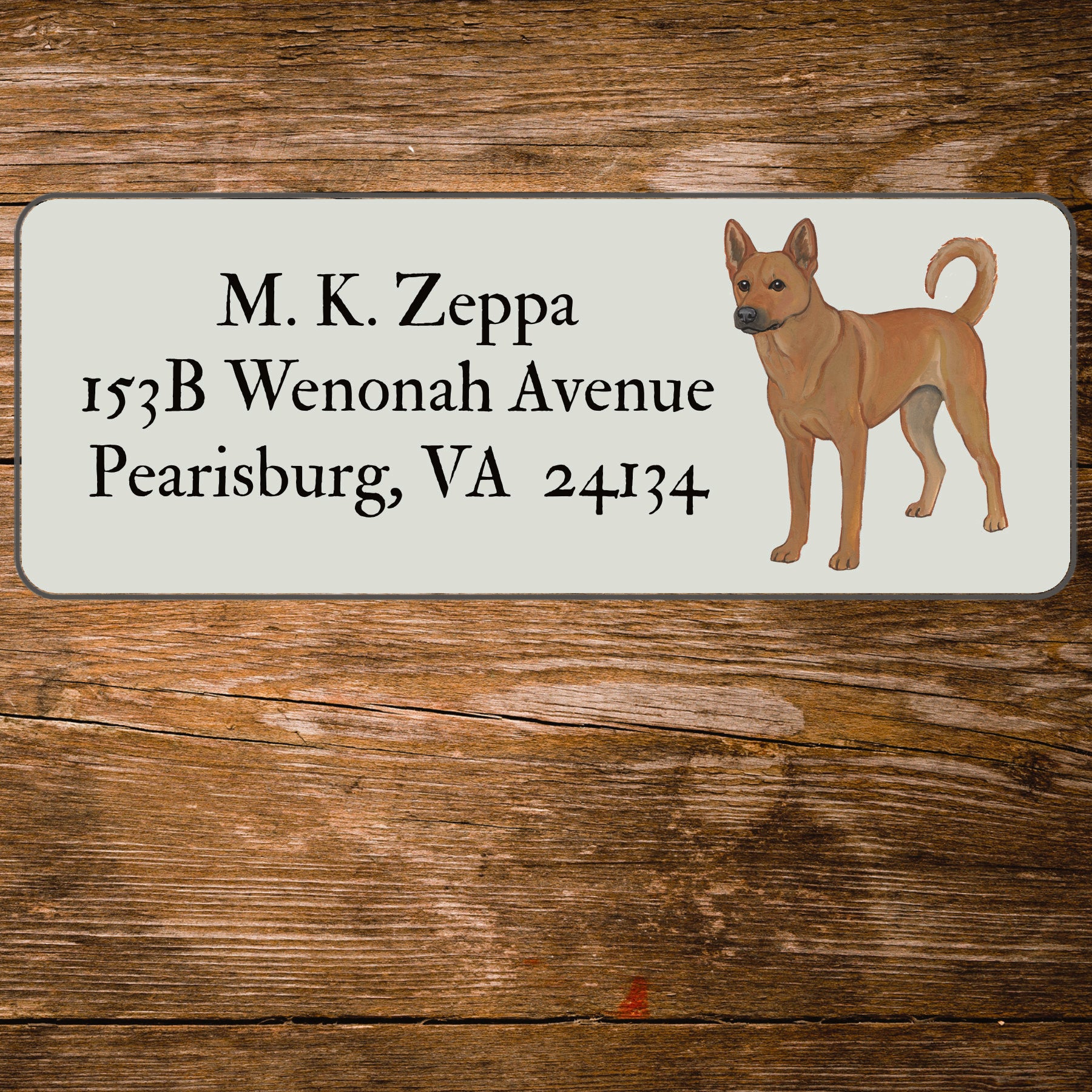 Return address label with a Carolina Dog illustration.