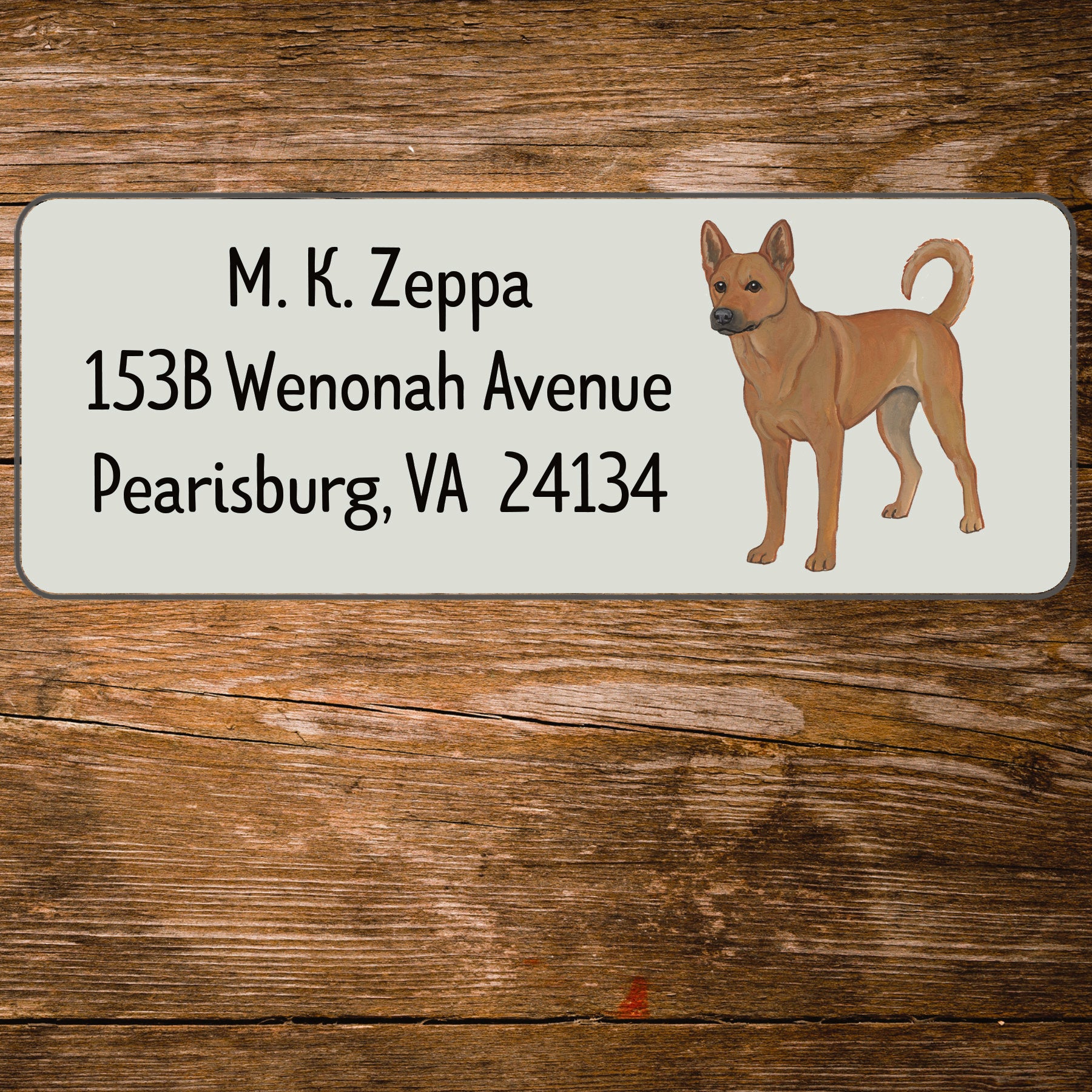 Return address label with a Carolina Dog illustration.