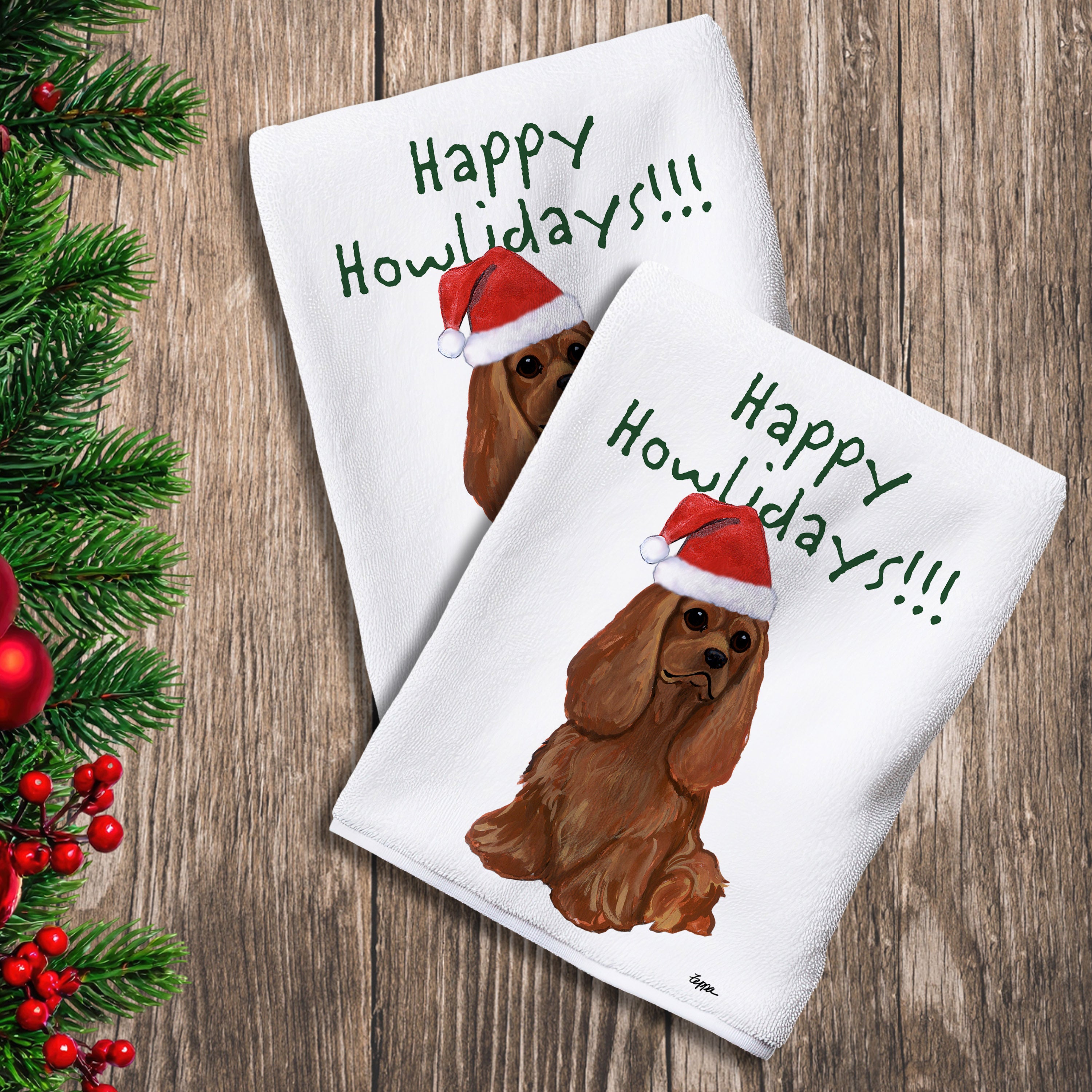 2 Kitchen Towels with a Ruby Cavalier King Charles Spaniel in a Santa Hat and Happy Howlidays text.