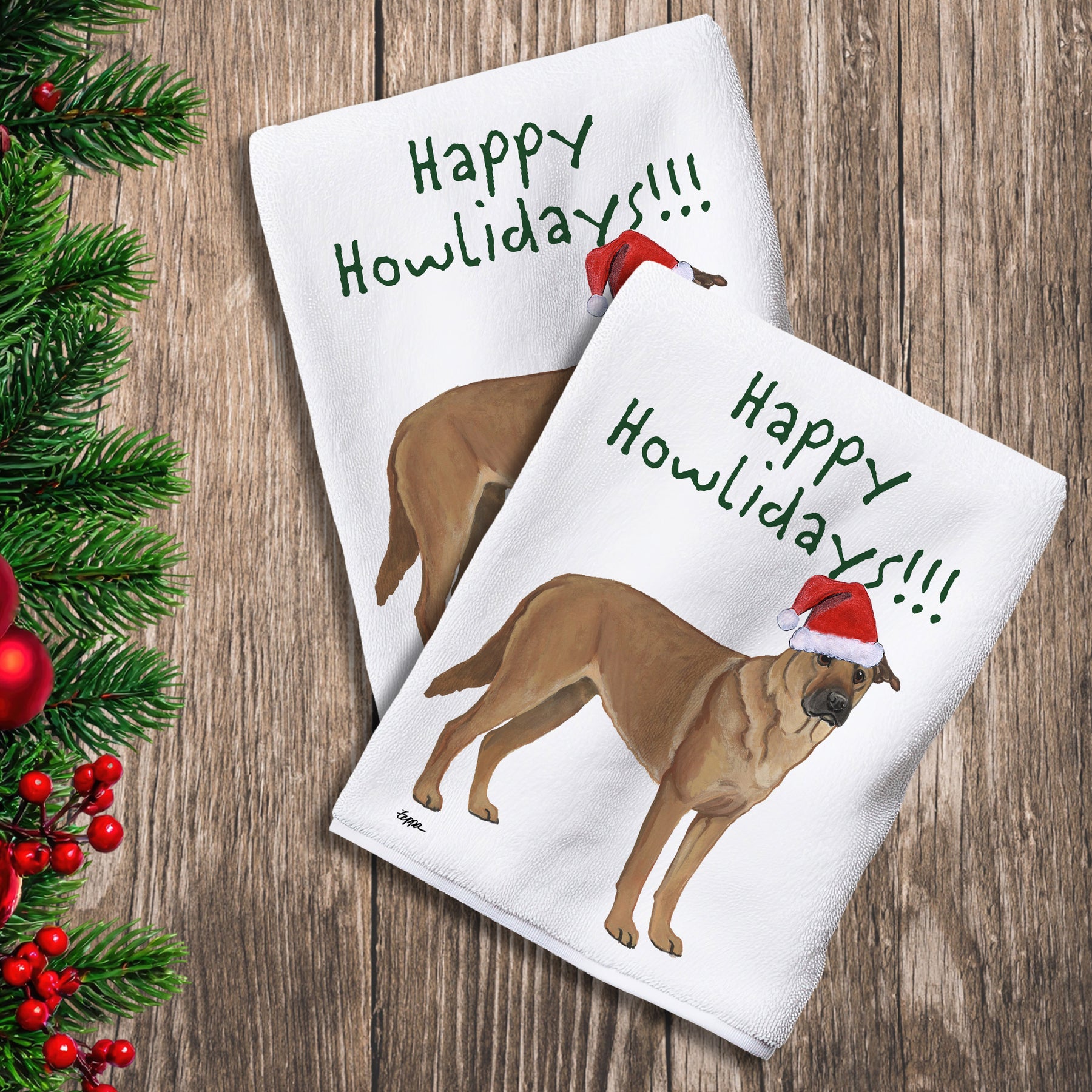 2 Kitchen Towels with a Chinook in a Santa Hat and Happy Howlidays text.