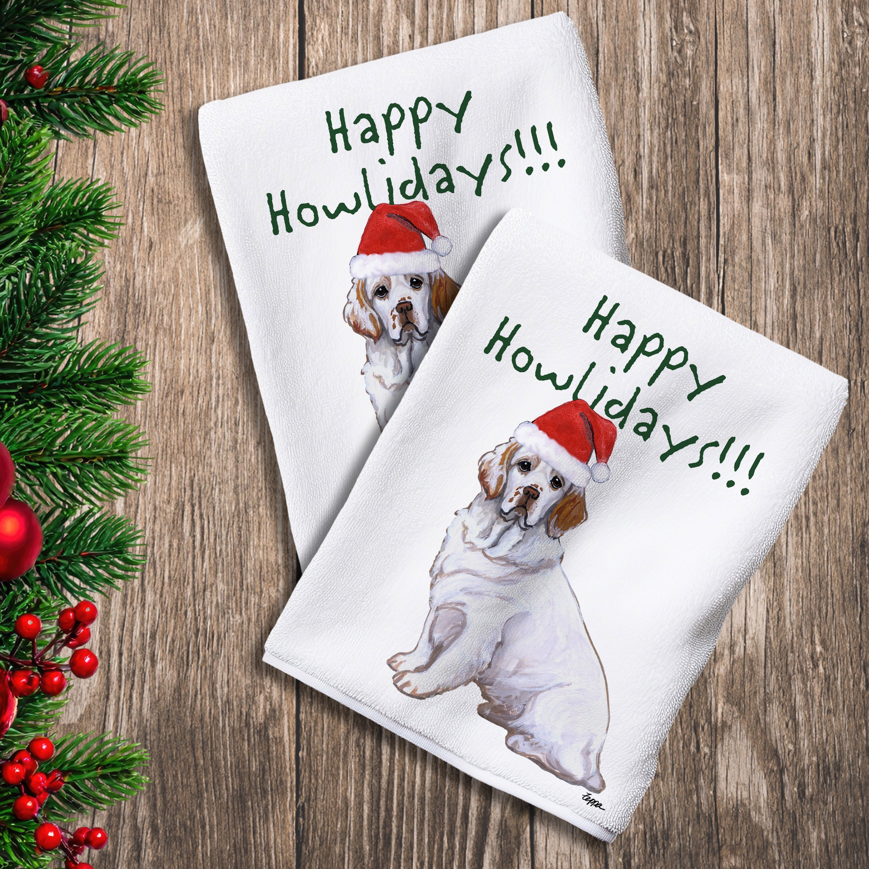 2 Kitchen Towels with a Clumber Spaniel in a Santa Hat and Happy Howlidays text.