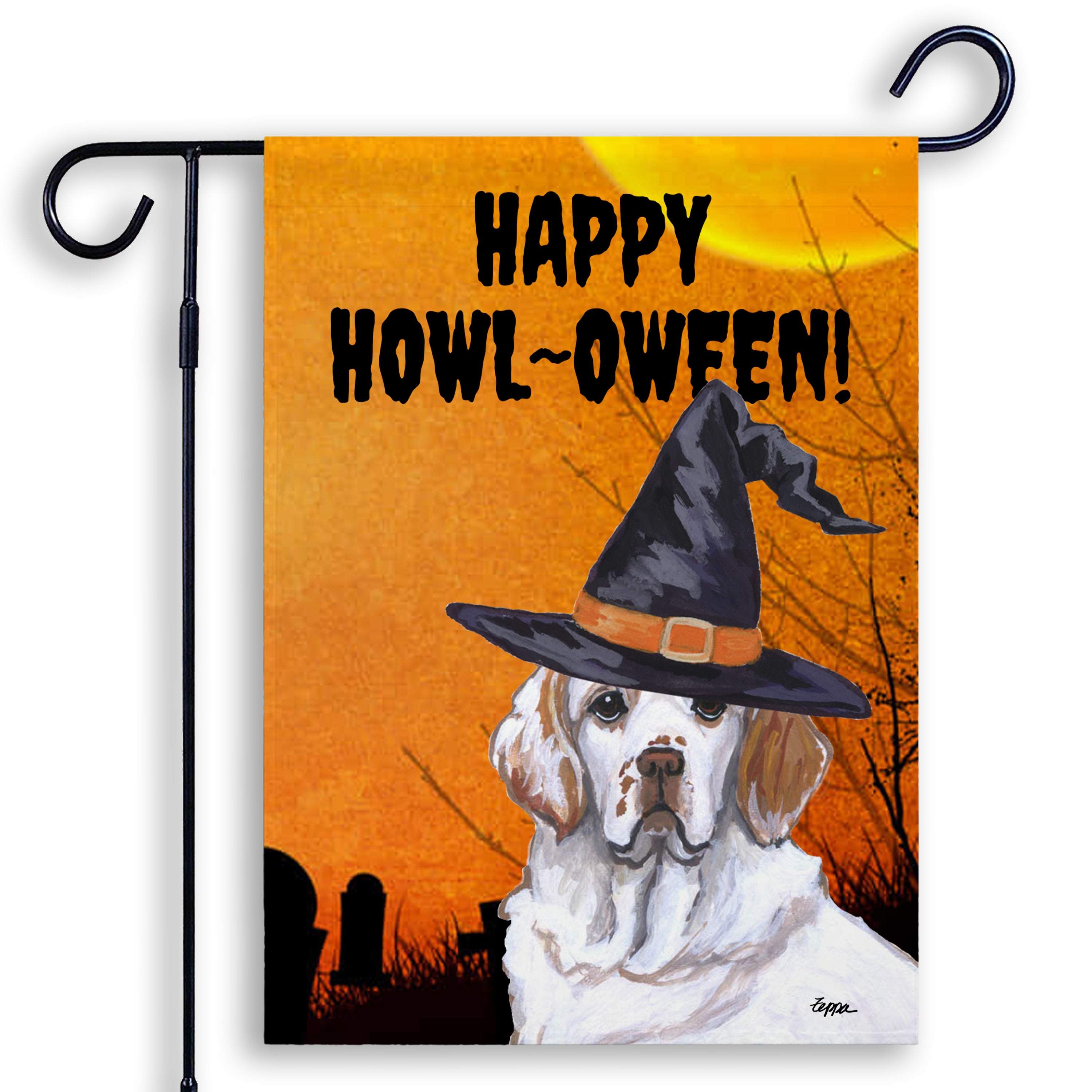Halloween-themed garden flag with a Clumber Spaniel wearing a witch hat and 'Happy Howl-Oween!' text on an orange background.