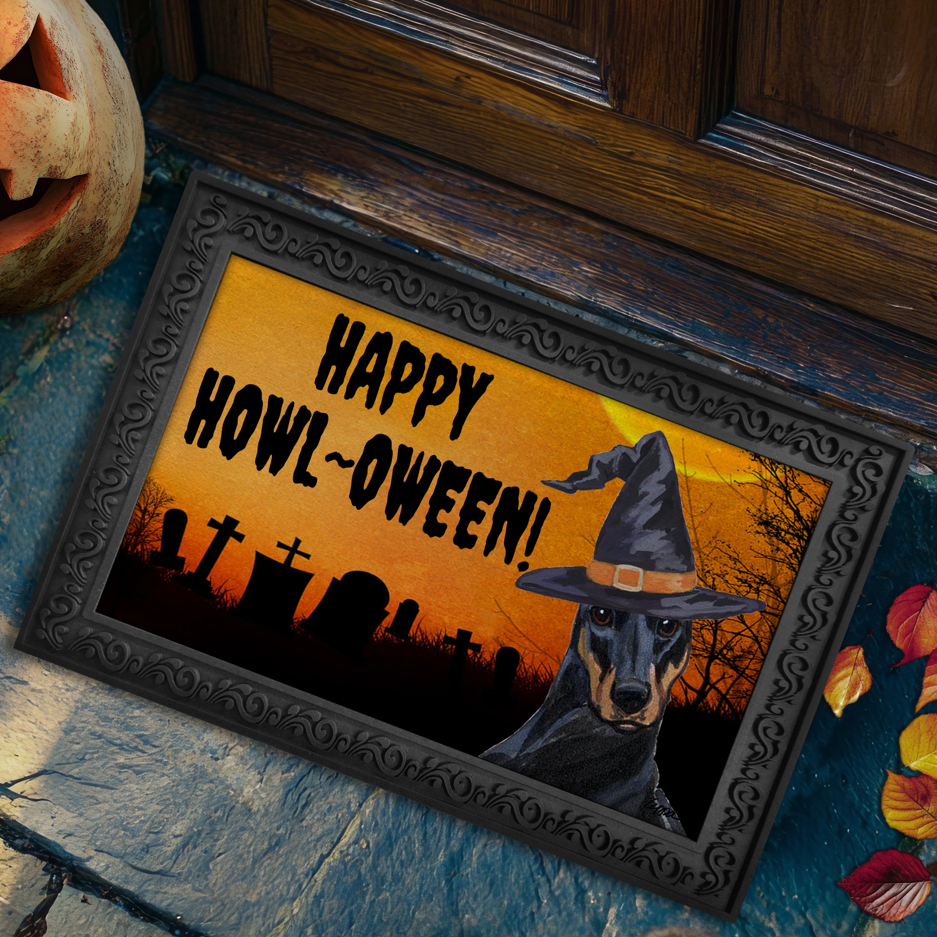 Halloween-themed doormat with a Doberman Pinscher wearing a witch hat and 'Happy Howl-Oween!' text on a doorstep.