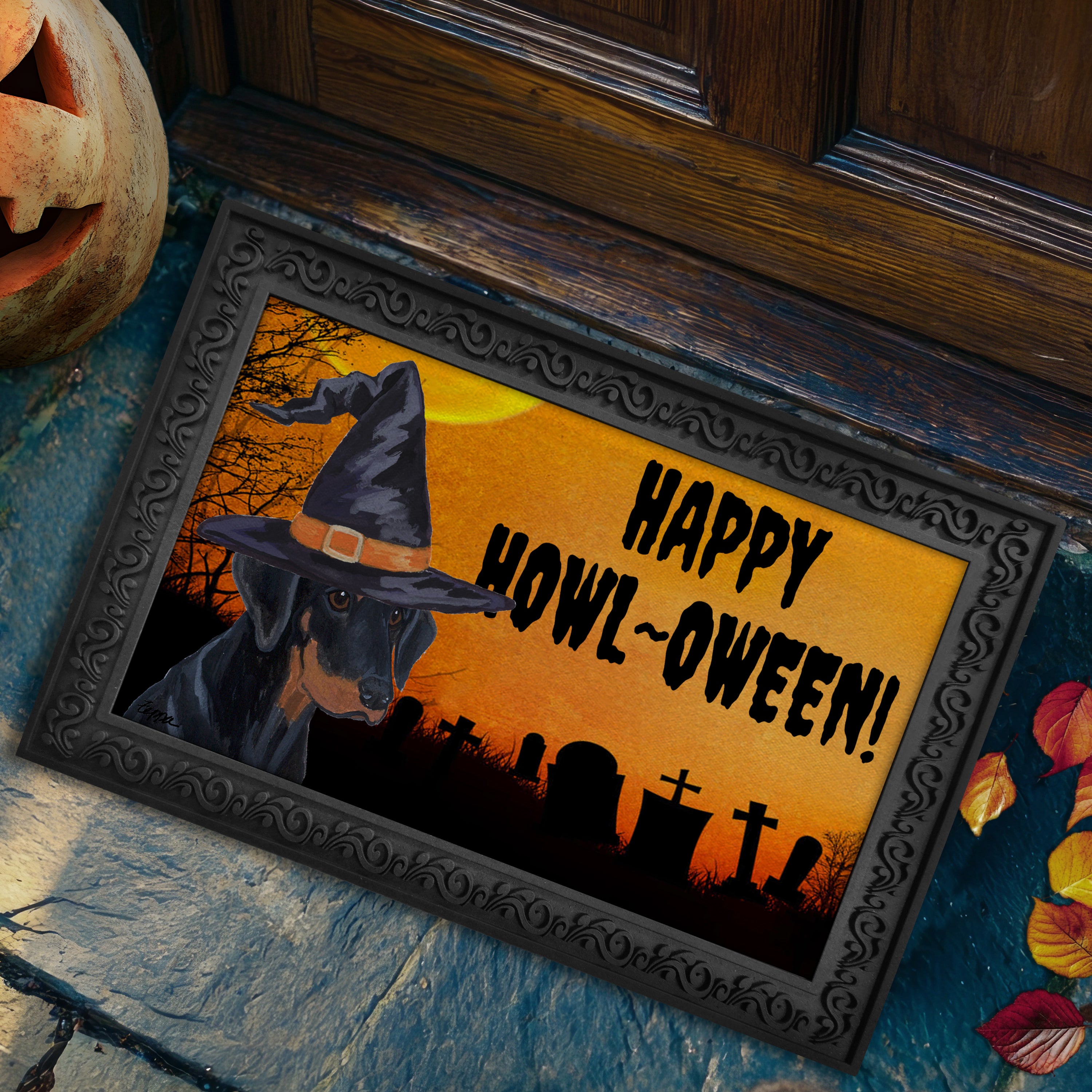 Halloween-themed doormat with a Doberman Pinscher wearing a witch hat and 'Happy Howl-Oween!' text on a doorstep.