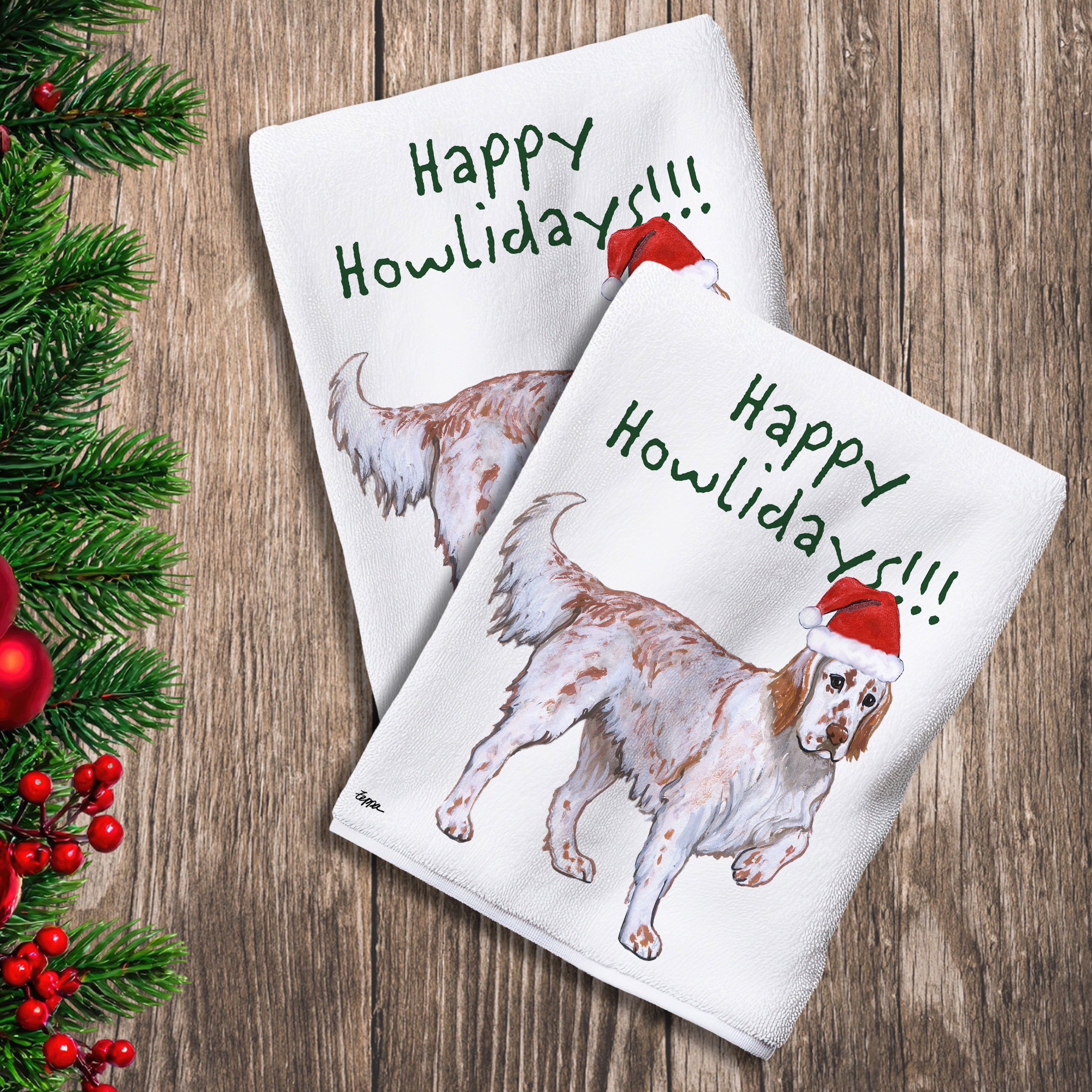 2 Kitchen Towels with a red belton English Setter in a Santa Hat and Happy Howlidays text. 