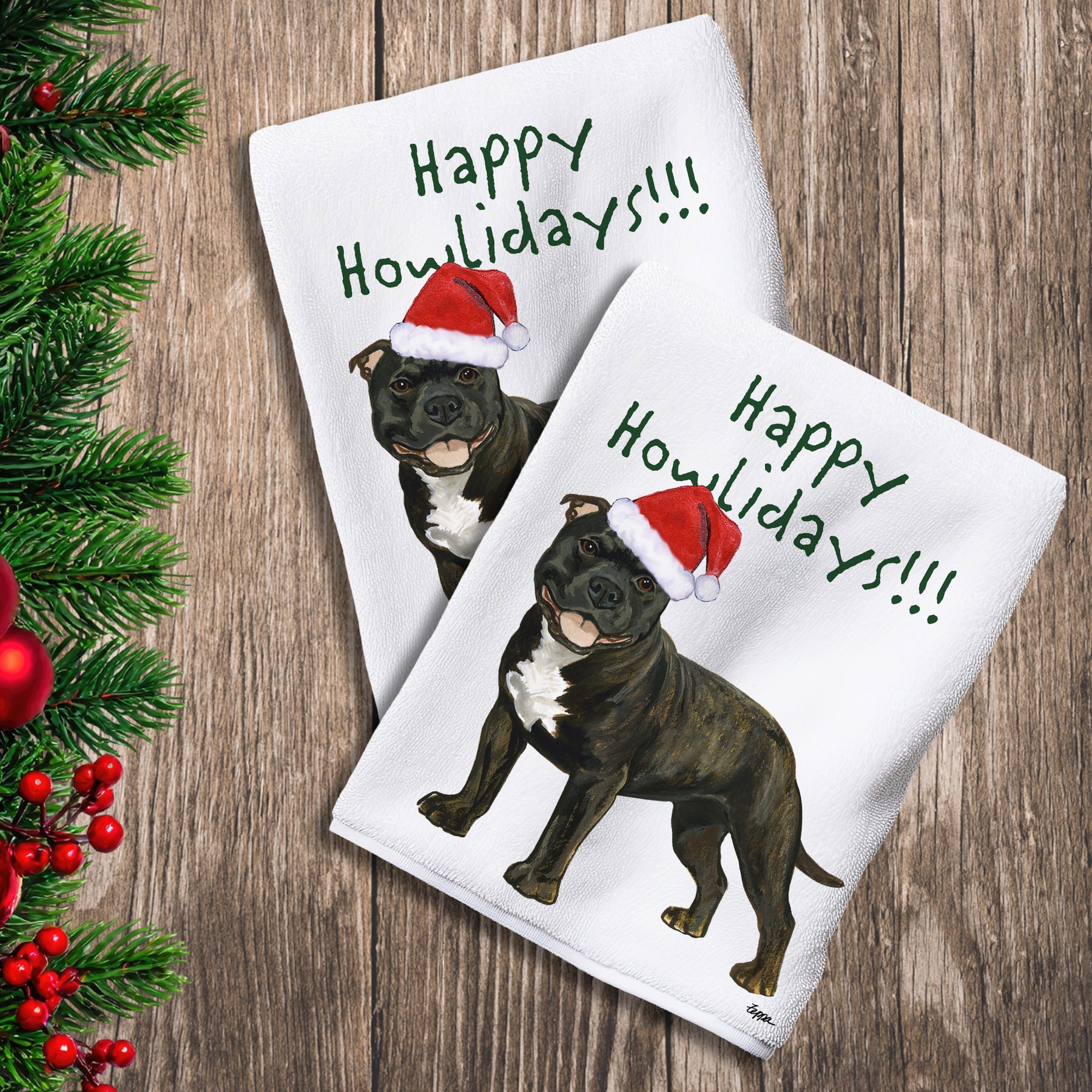 2 Kitchen Towels with a brindle English Staffordshire Terrier in a Santa Hat and Happy Howlidays text. 