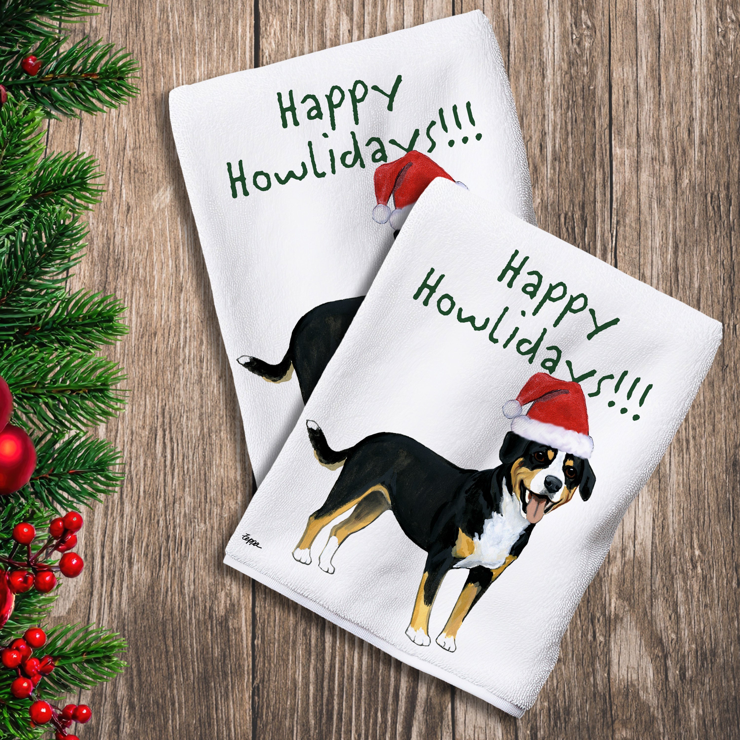 2 Kitchen Towels with a Entelbucher Mountain Dog in a Santa Hat and Happy Howlidays text. 