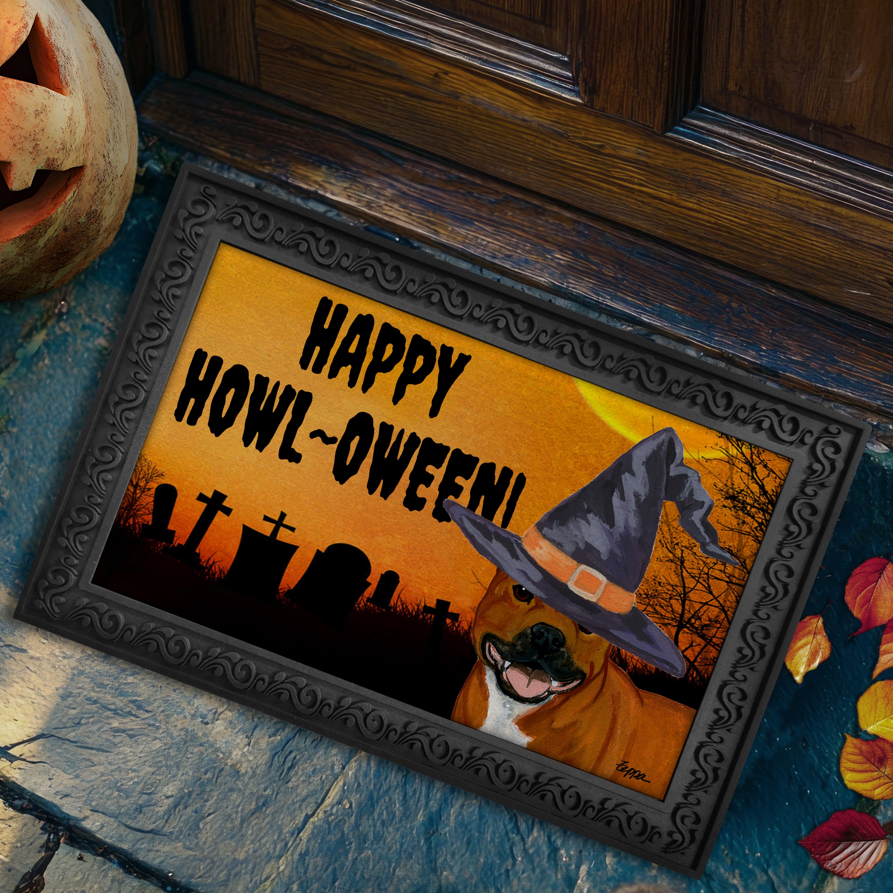 Halloween-themed doormat with a English Staffordshire Terrier wearing a witch hat and 'Happy Howl-Oween!' text on a doorstep.