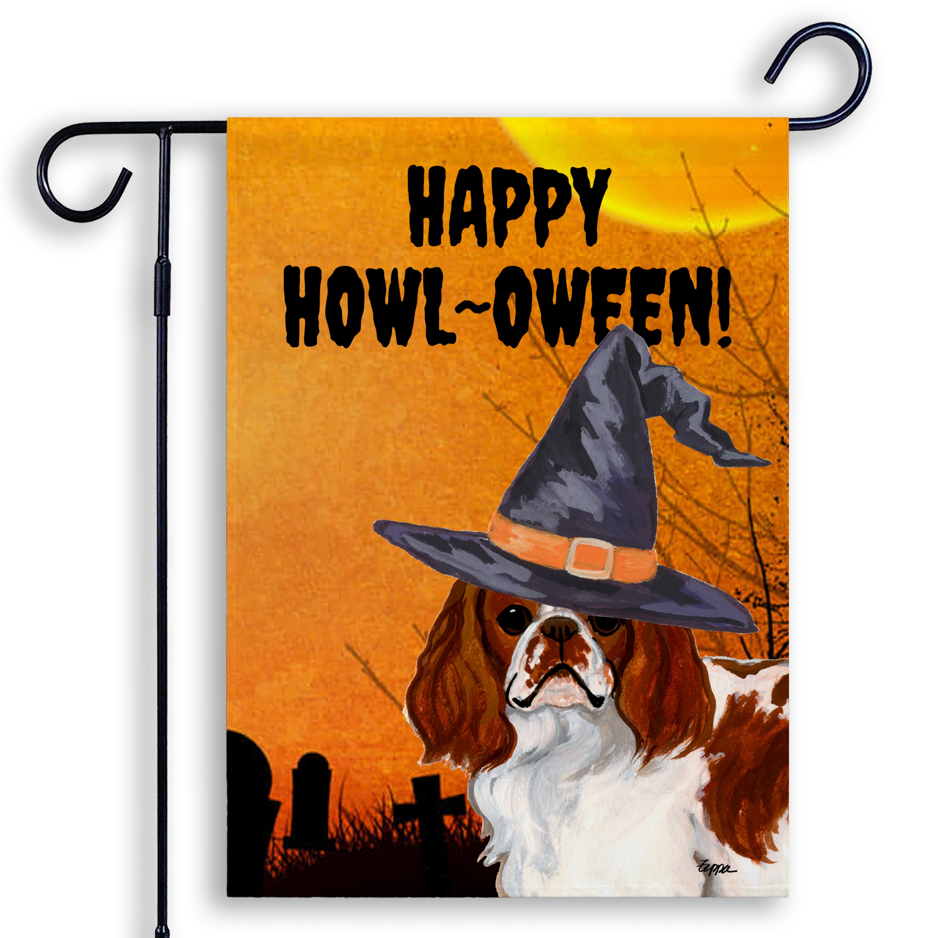 Halloween-themed garden flag with a English Toy Spaniel wearing a witch hat and 'Happy Howl-Oween!' text on an orange background.