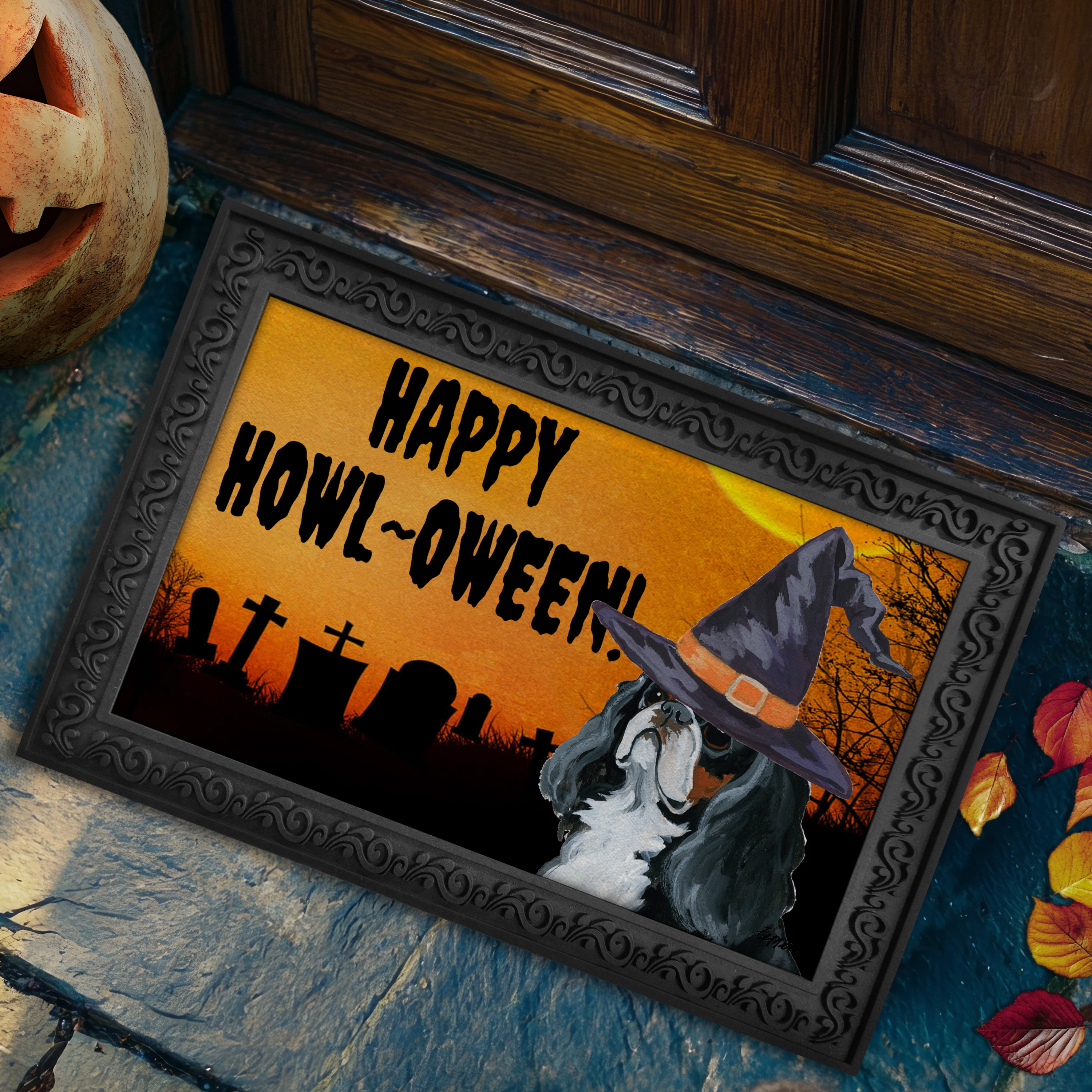 Halloween-themed doormat with a English Toy Spaniel wearing a witch hat and 'Happy Howl-Oween!' text on a doorstep.