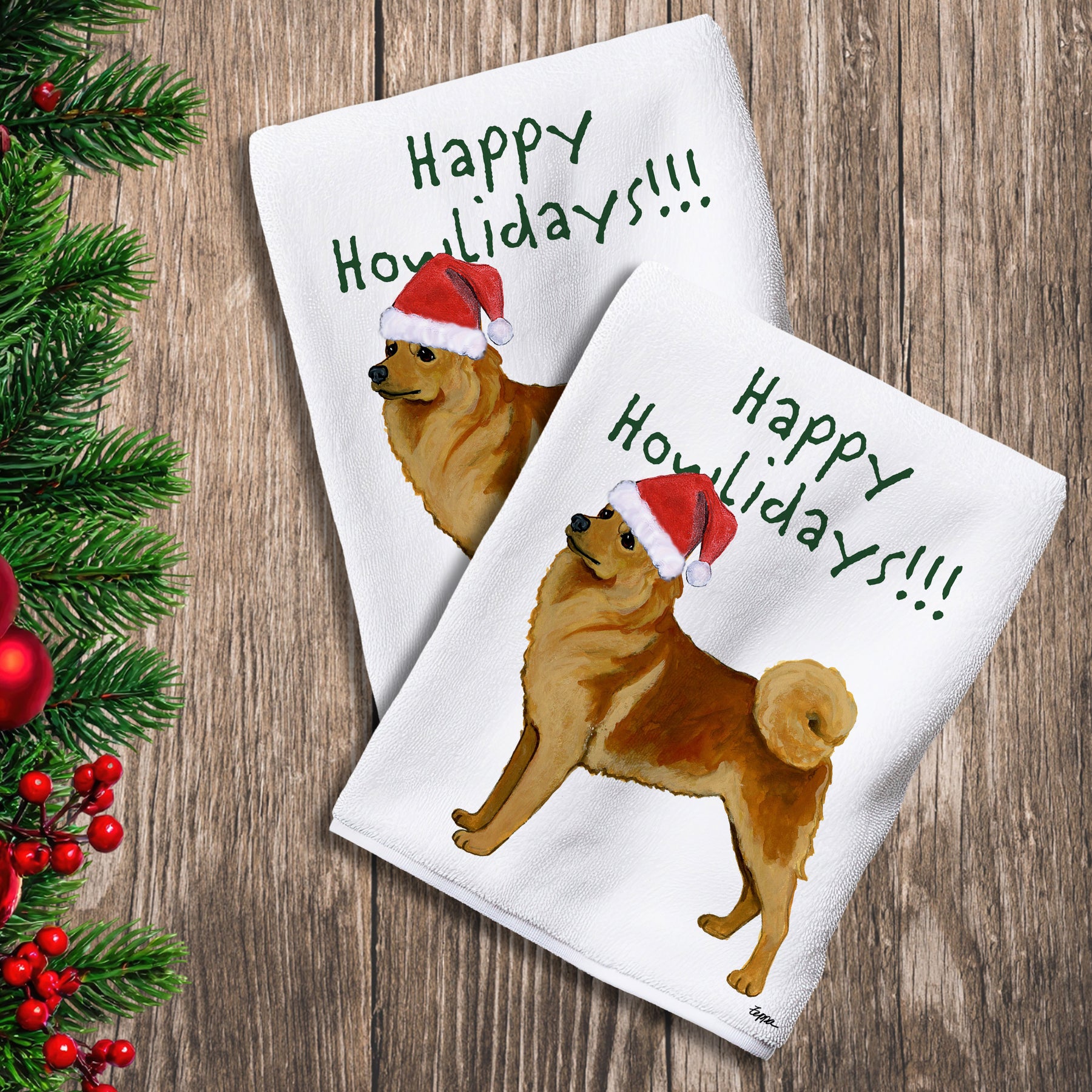 2 Kitchen Towels with a Finnish Spitz in a Santa Hat and Happy Howlidays text.
