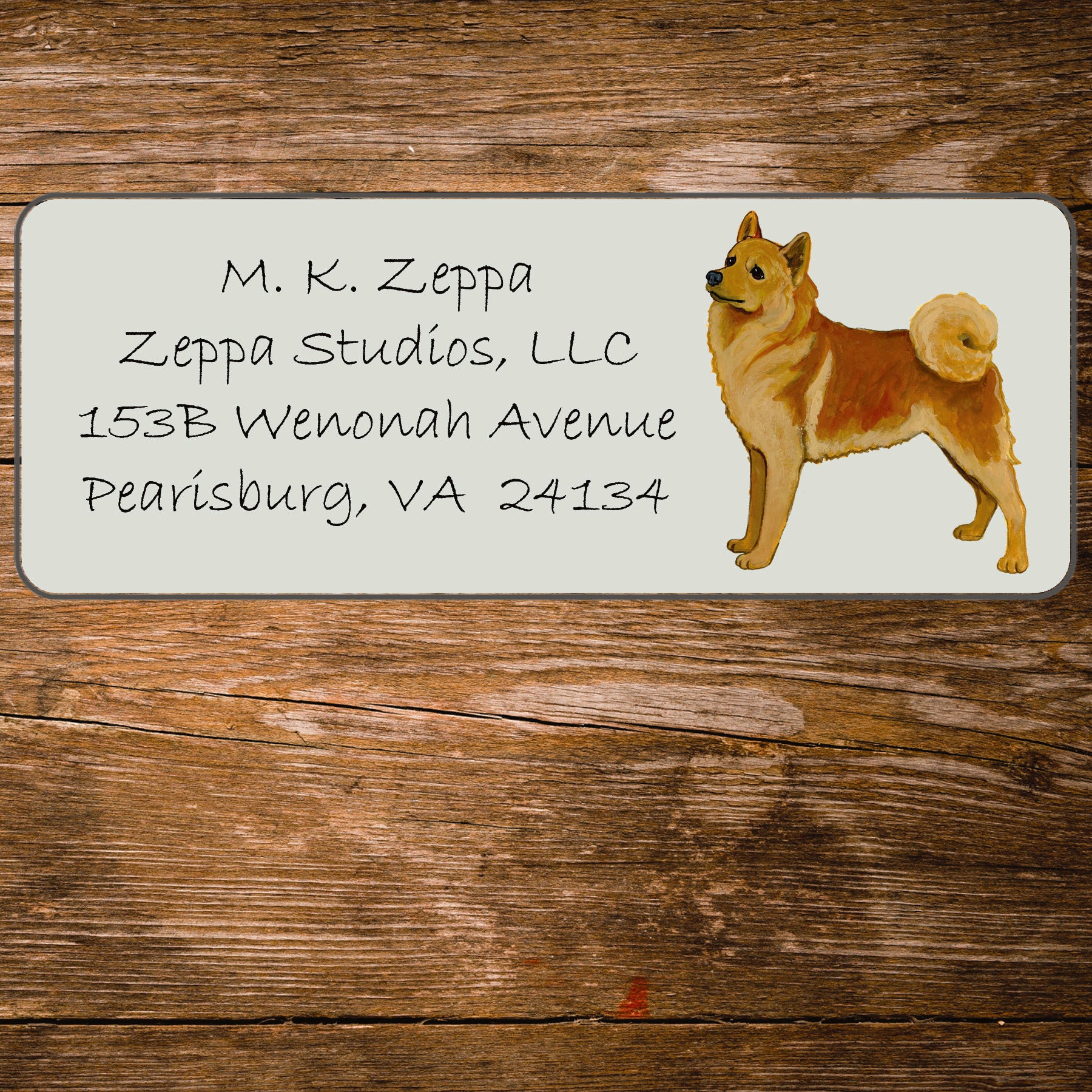 Return address label with an illustration of a Finnish Spitz