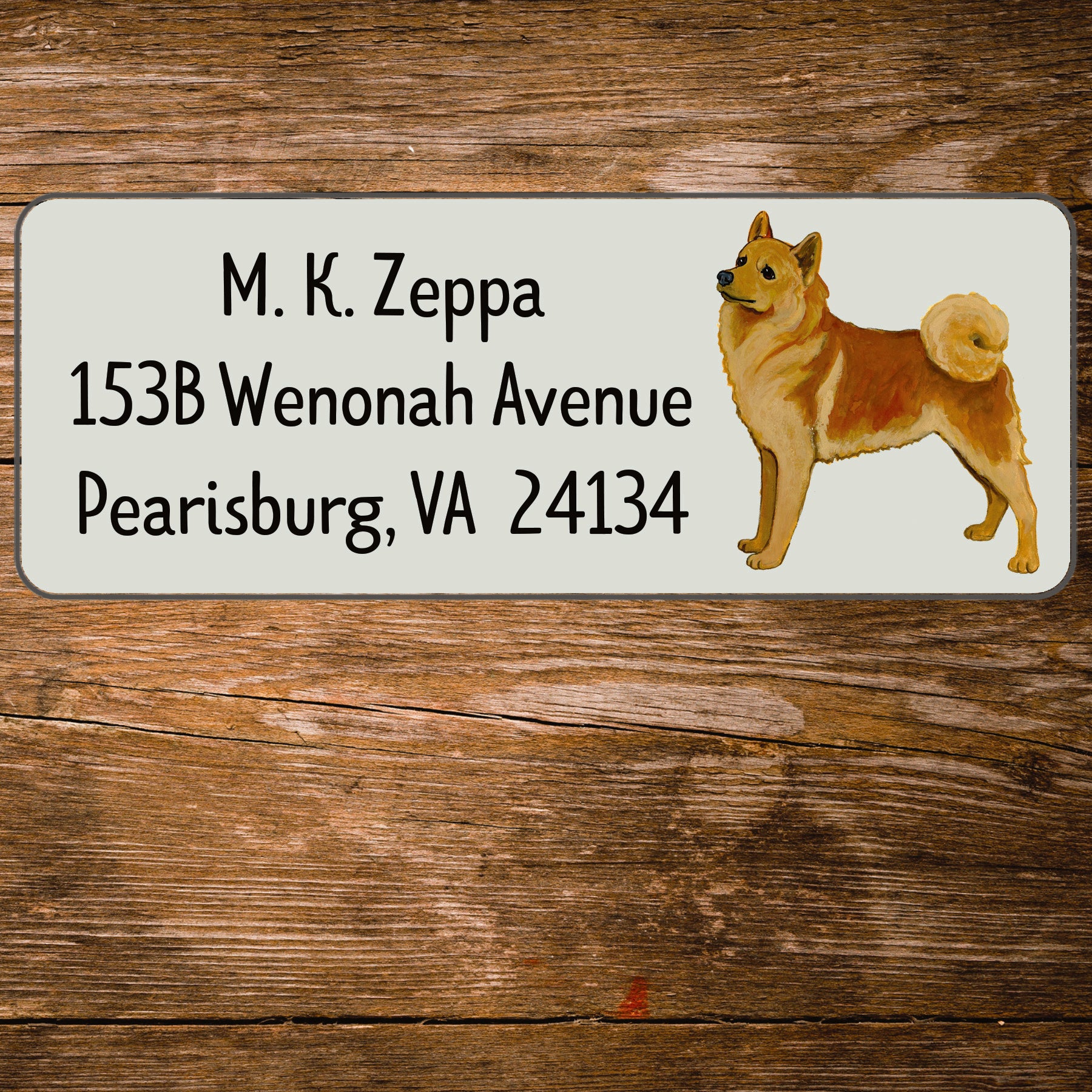 Return address label with an illustration of a Finnish Spitz
