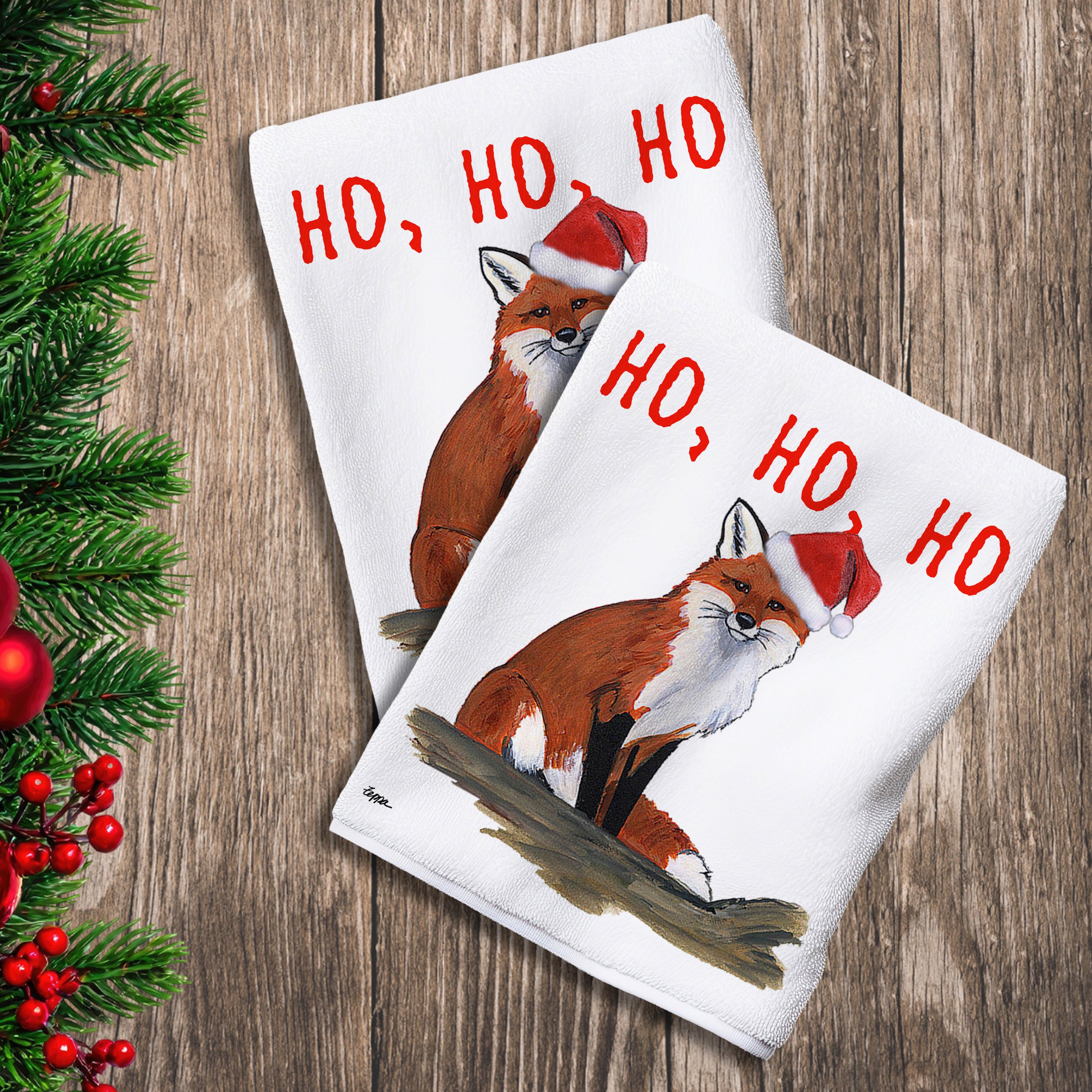 2 Kitchen Towels with a Sitting Fox and Ho Ho Ho text.