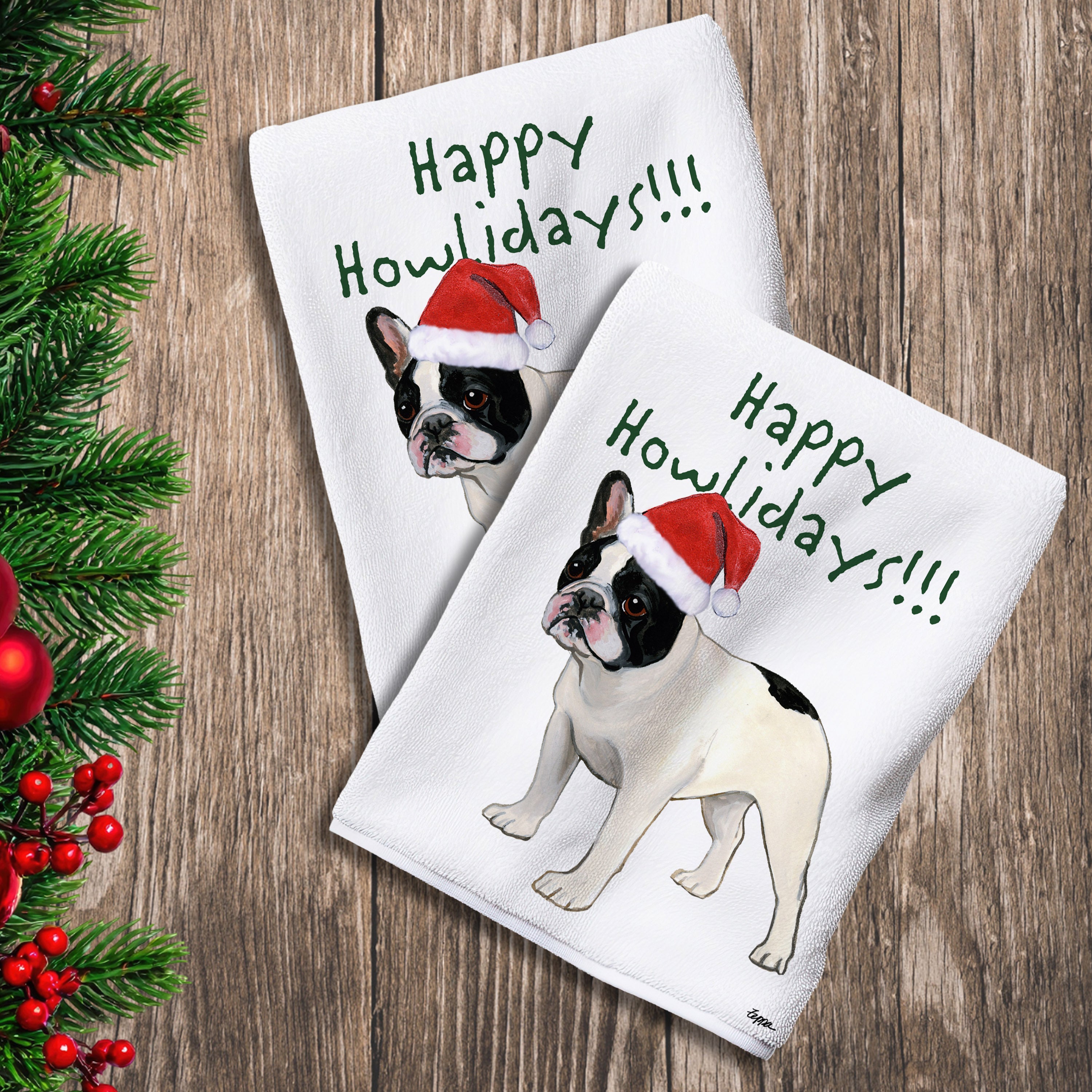 2 Kitchen Towels with a black and white French Bulldog in a Santa Hat and Happy Howlidays text. 