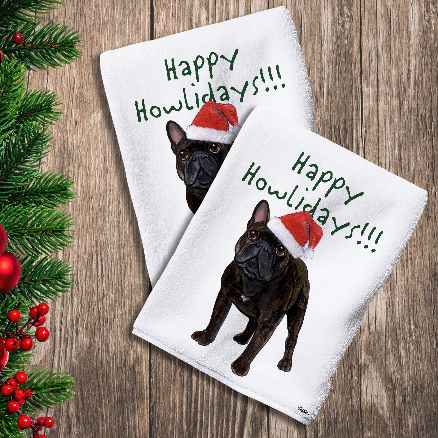 2 Kitchen Towels with a French Bulldog in a Santa Hat and Happy Howlidays text. 