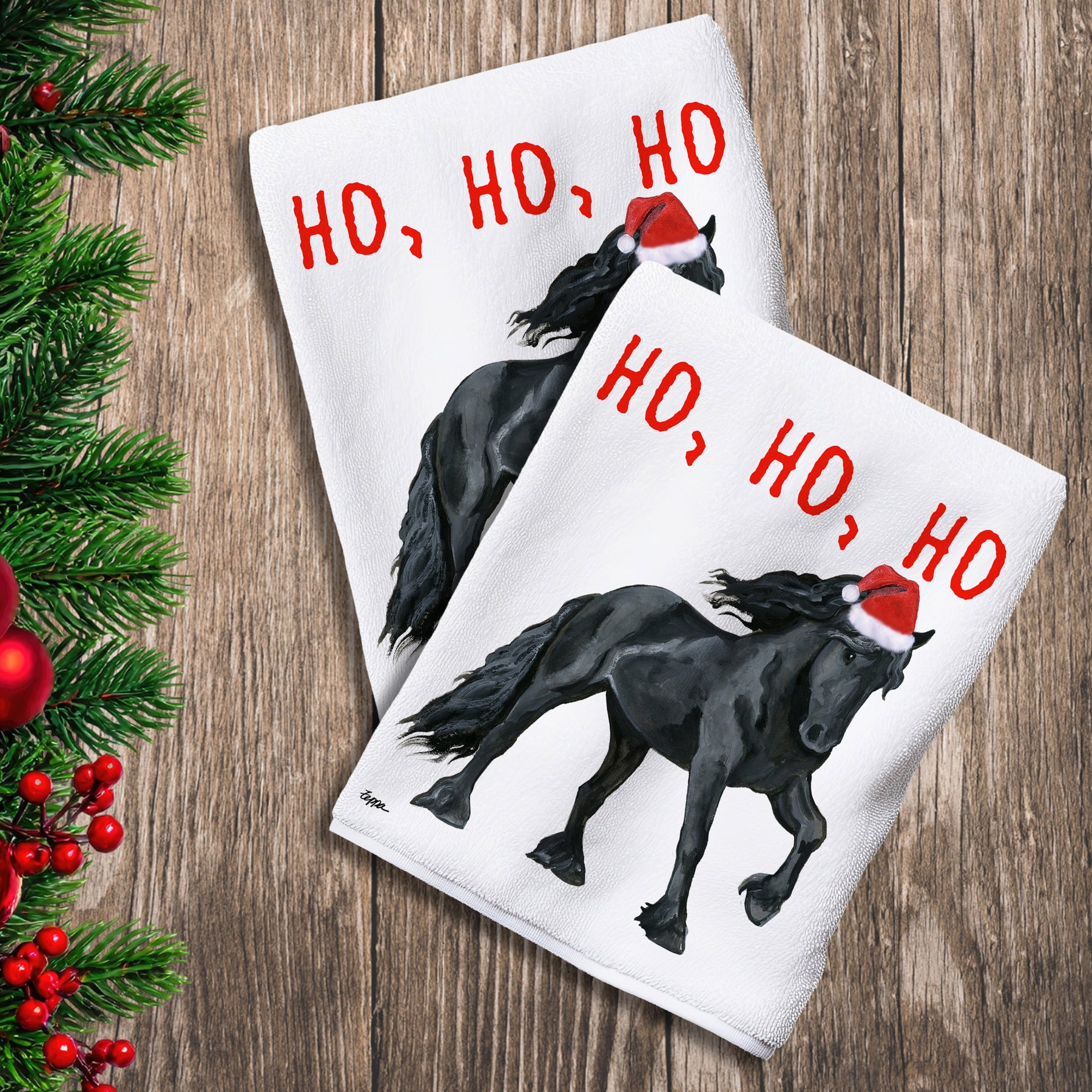 2 Kitchen Towels with a Friesian horse in a Santa Hat and Ho Ho Ho text.

