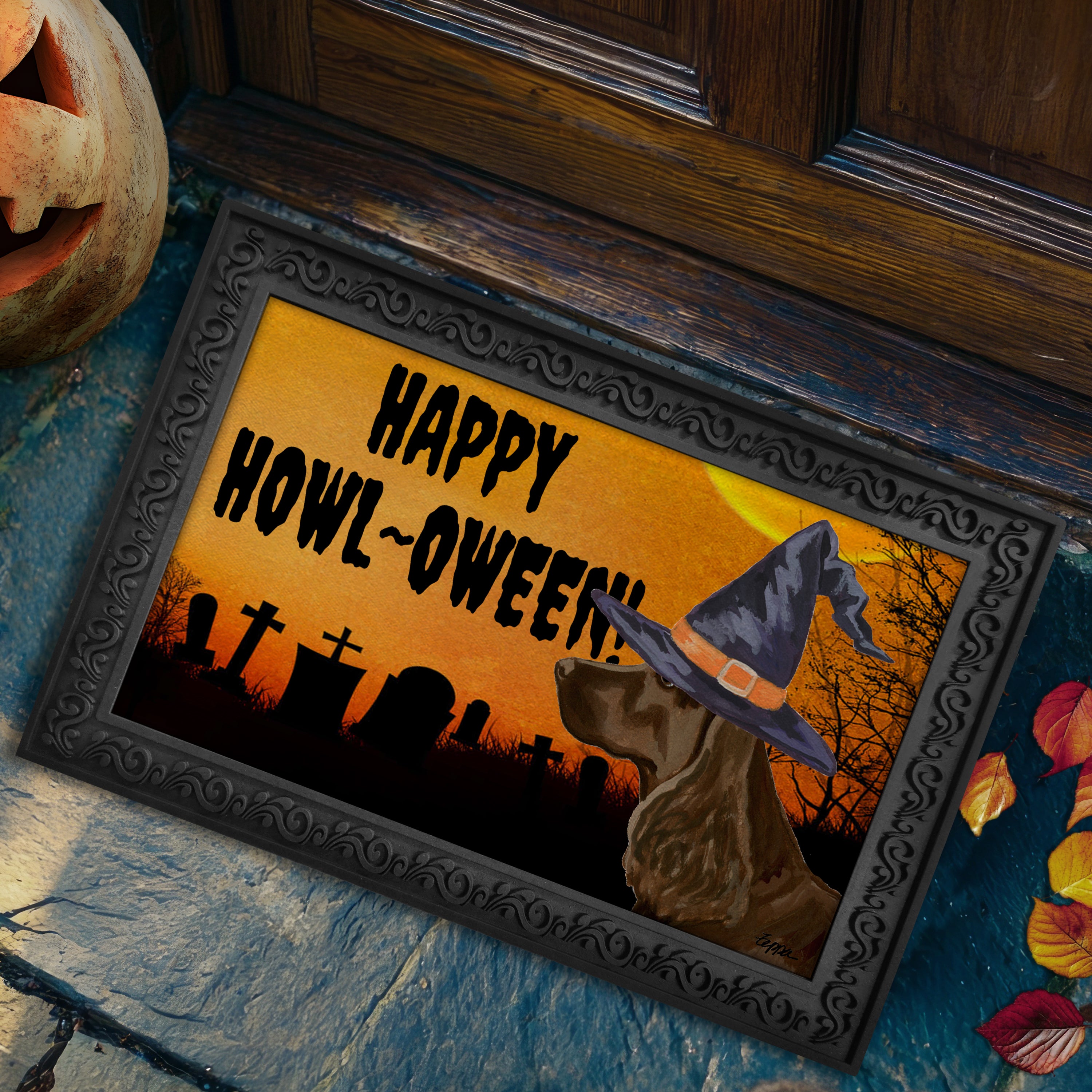 Halloween-themed doormat with a Field Spaniel wearing a witch hat and 'Happy Howl-Oween!' text, placed on a stone surface.