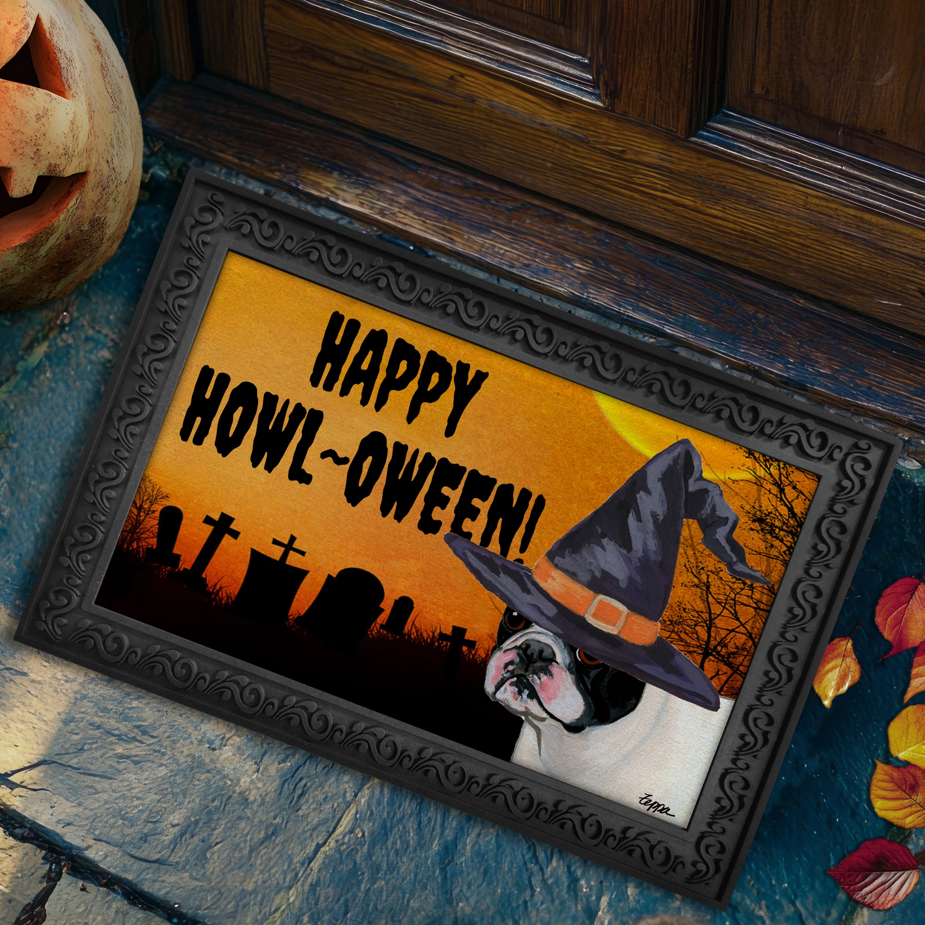 Halloween-themed doormat with a French Bulldog wearing a witch hat and 'Happy Howl-Oween!' text, placed on a stone surface.