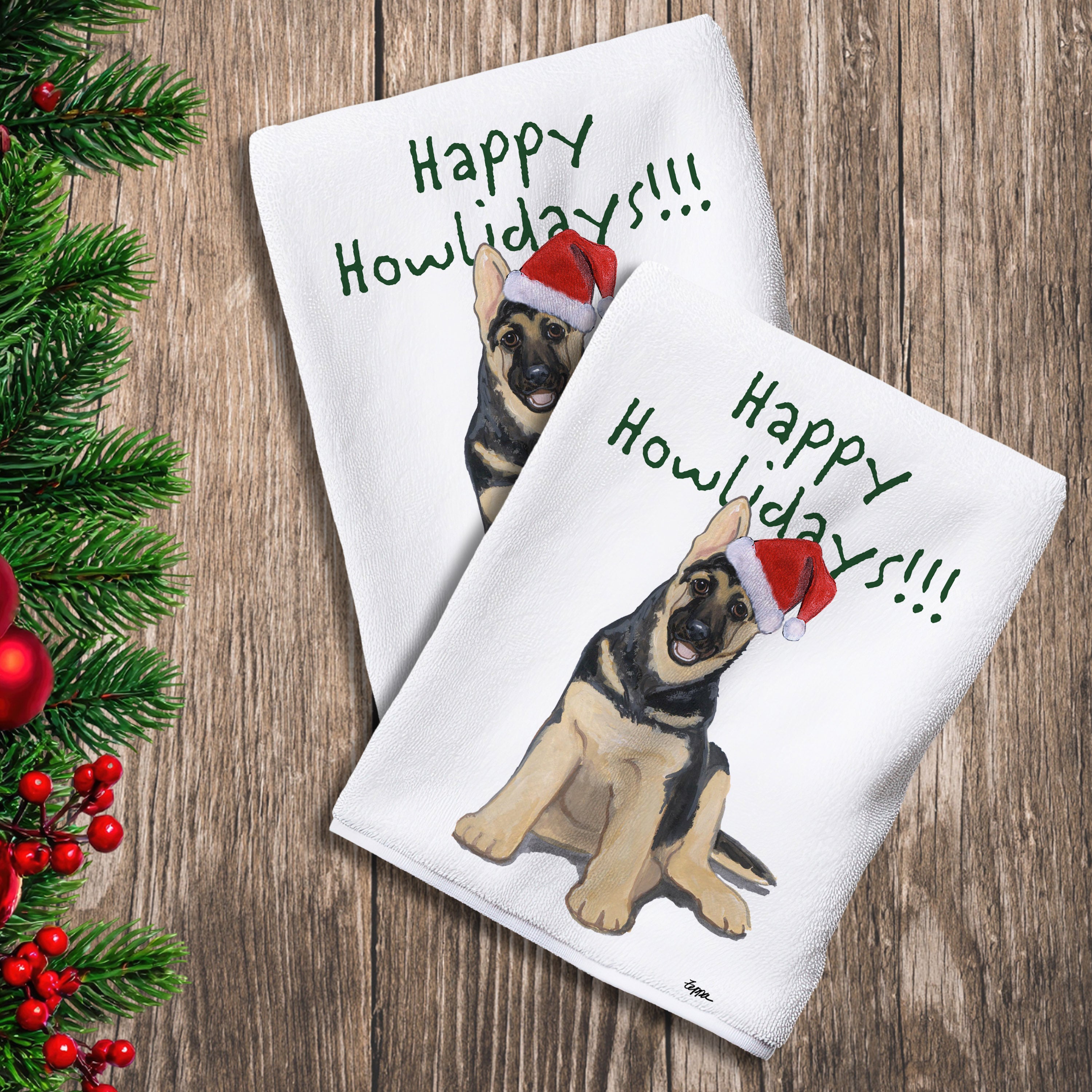 2 Kitchen Towels with a German Shepherd puppy in a Santa Hat and Happy Howlidays text. 