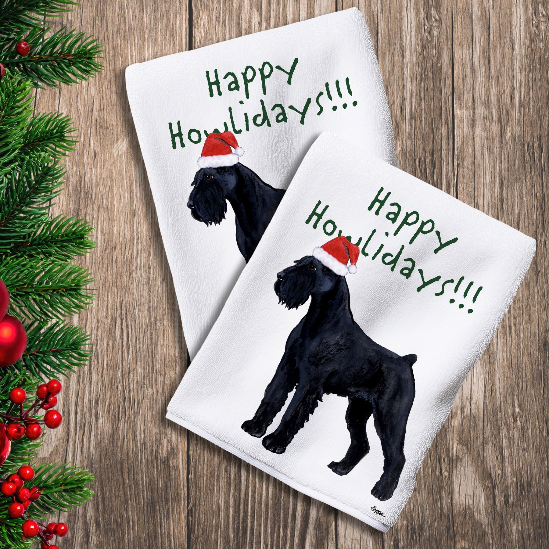 2 Kitchen Towels with a Giant Schnauzer in a Santa Hat and Happy Howlidays text. 