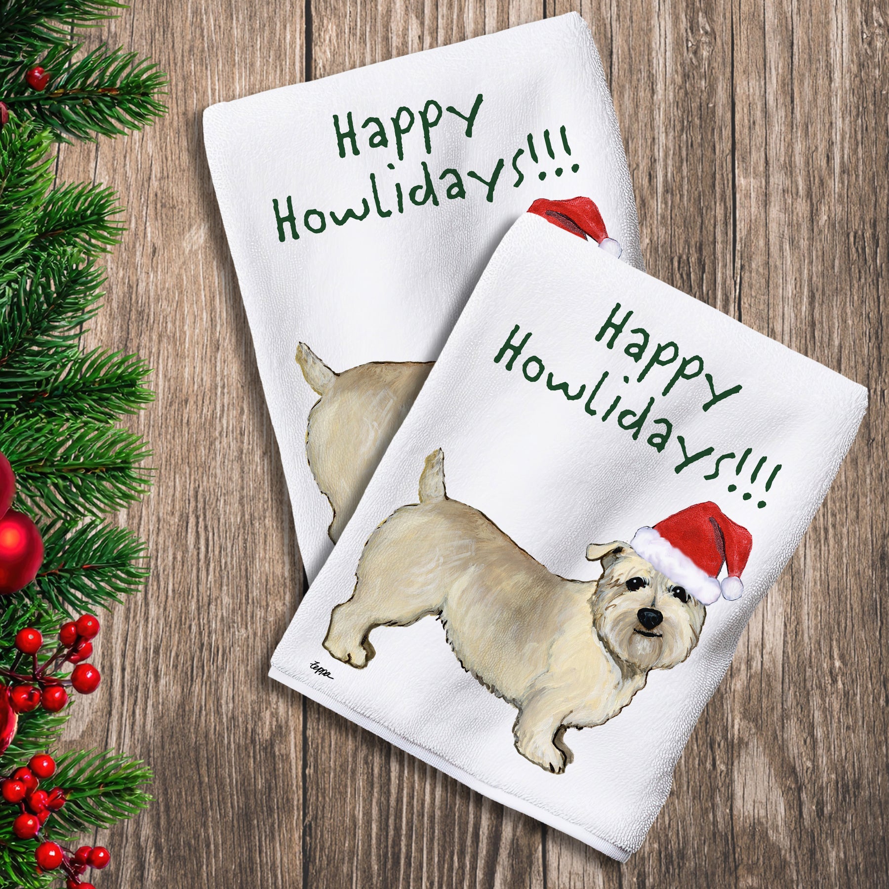 2 Kitchen Towels with an Glen of Imaal Terrier in a Santa Hat and Happy Howlidays text.
