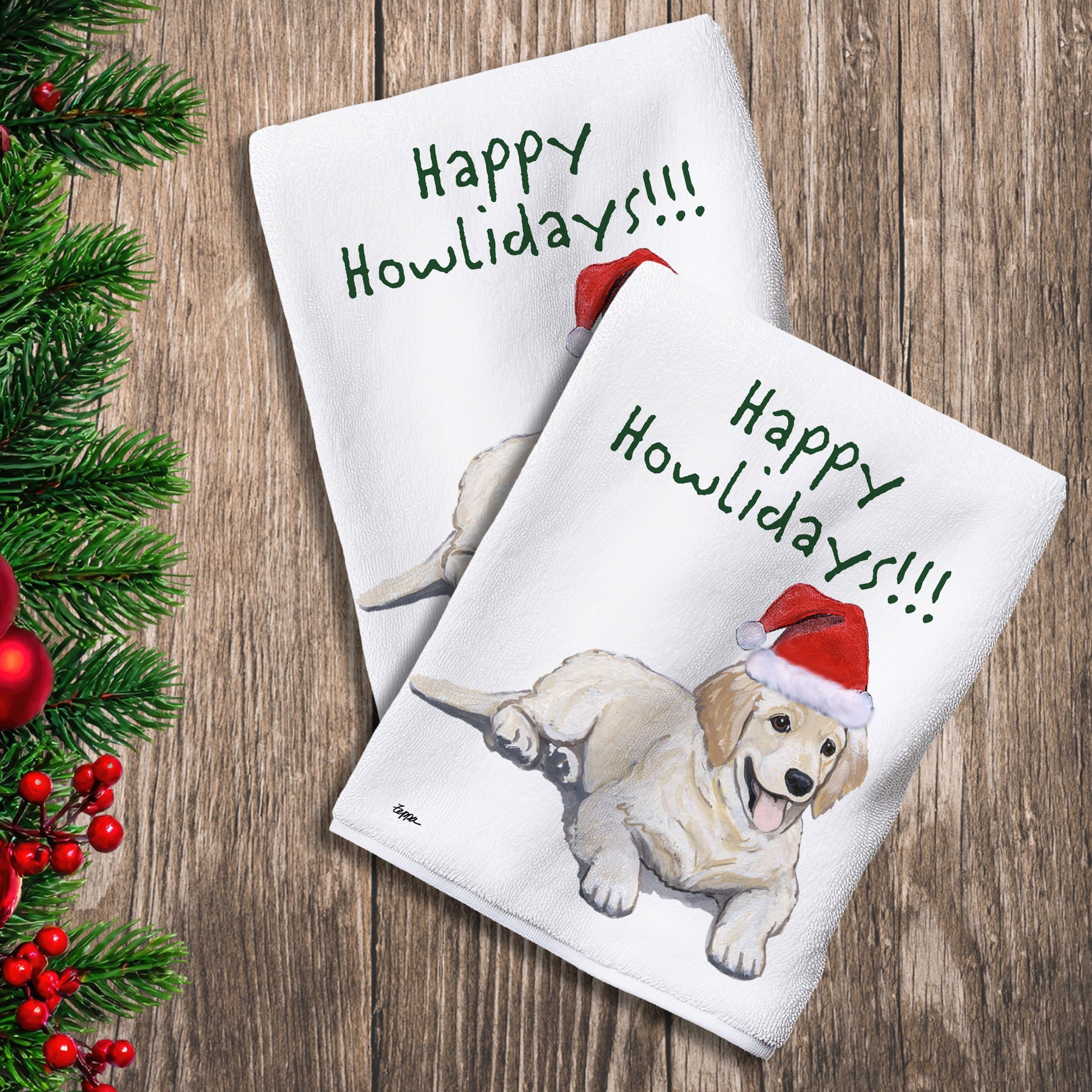2 Kitchen Towels with a Golden Retriever puppy in a Santa Hat and Happy Howlidays text.
