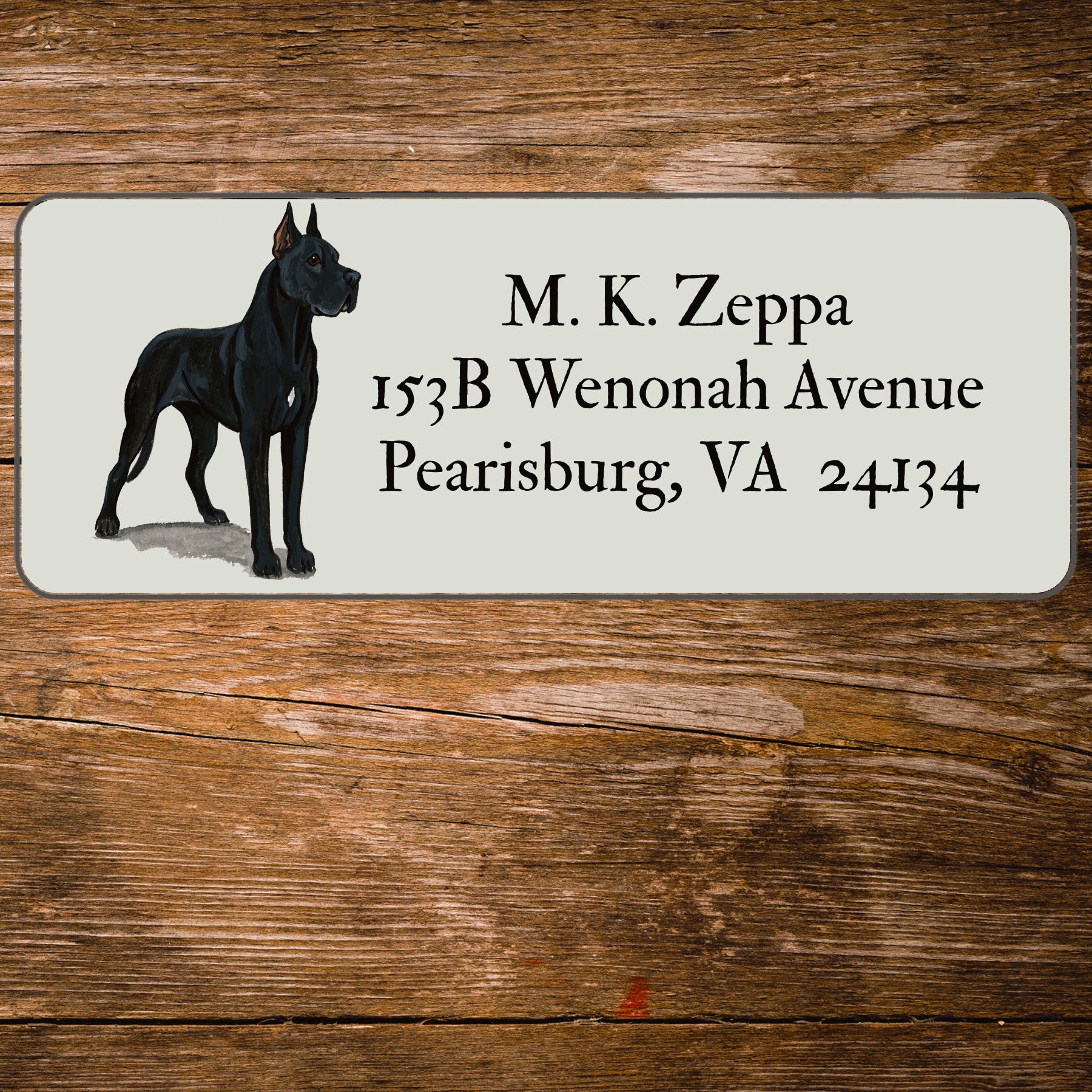 Return address label with a Great Dane illustration.