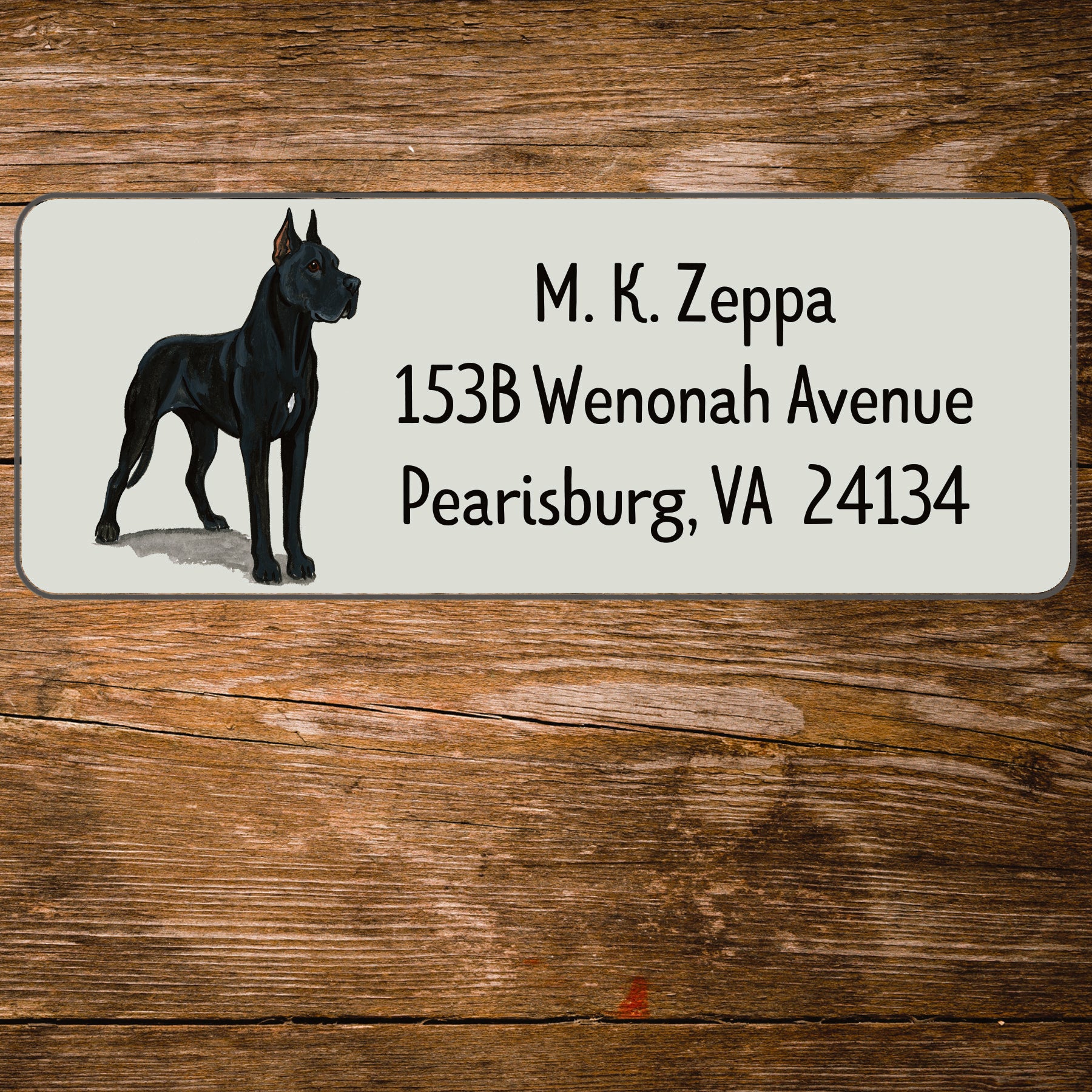 Return address label with a Great Dane illustration.
