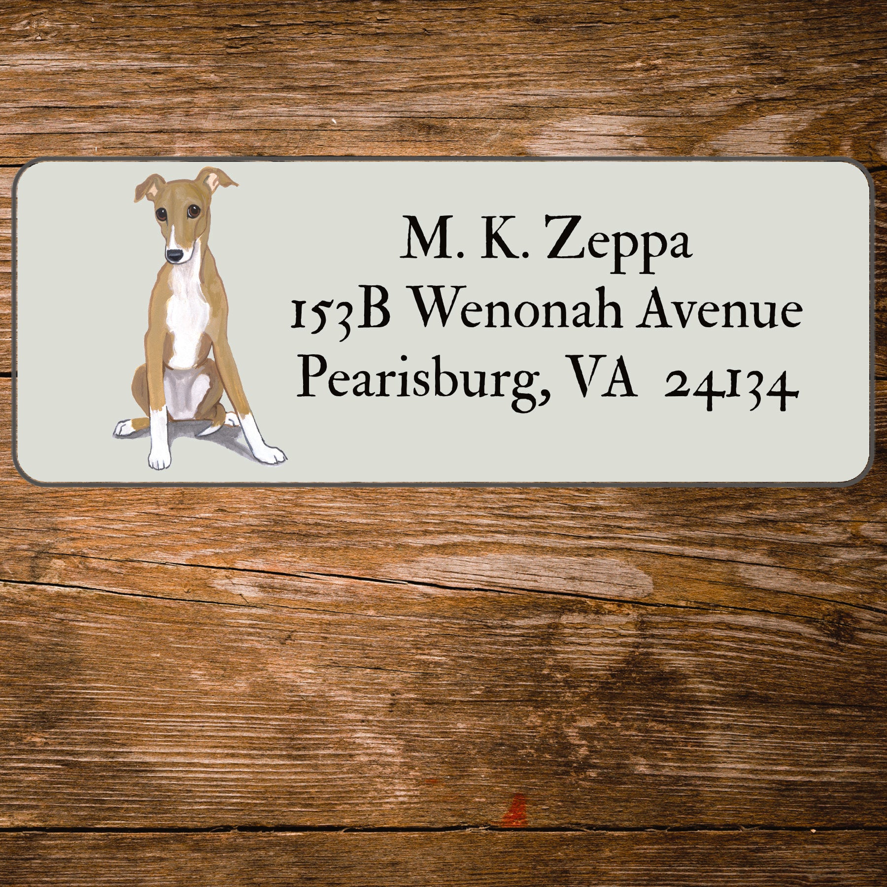 Return address label with a Greyhound illustration.
