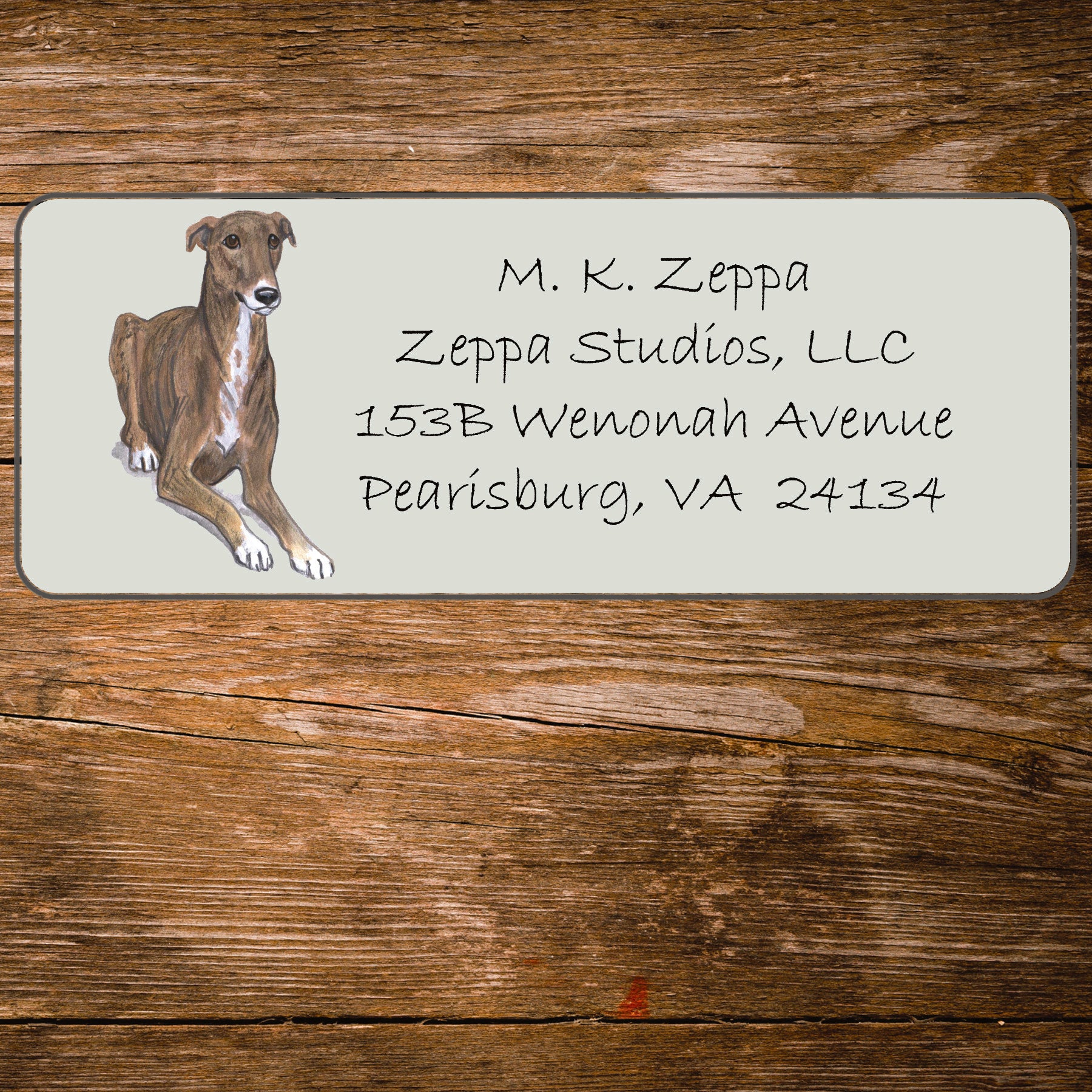 Return address label with a Greyhound illustration.