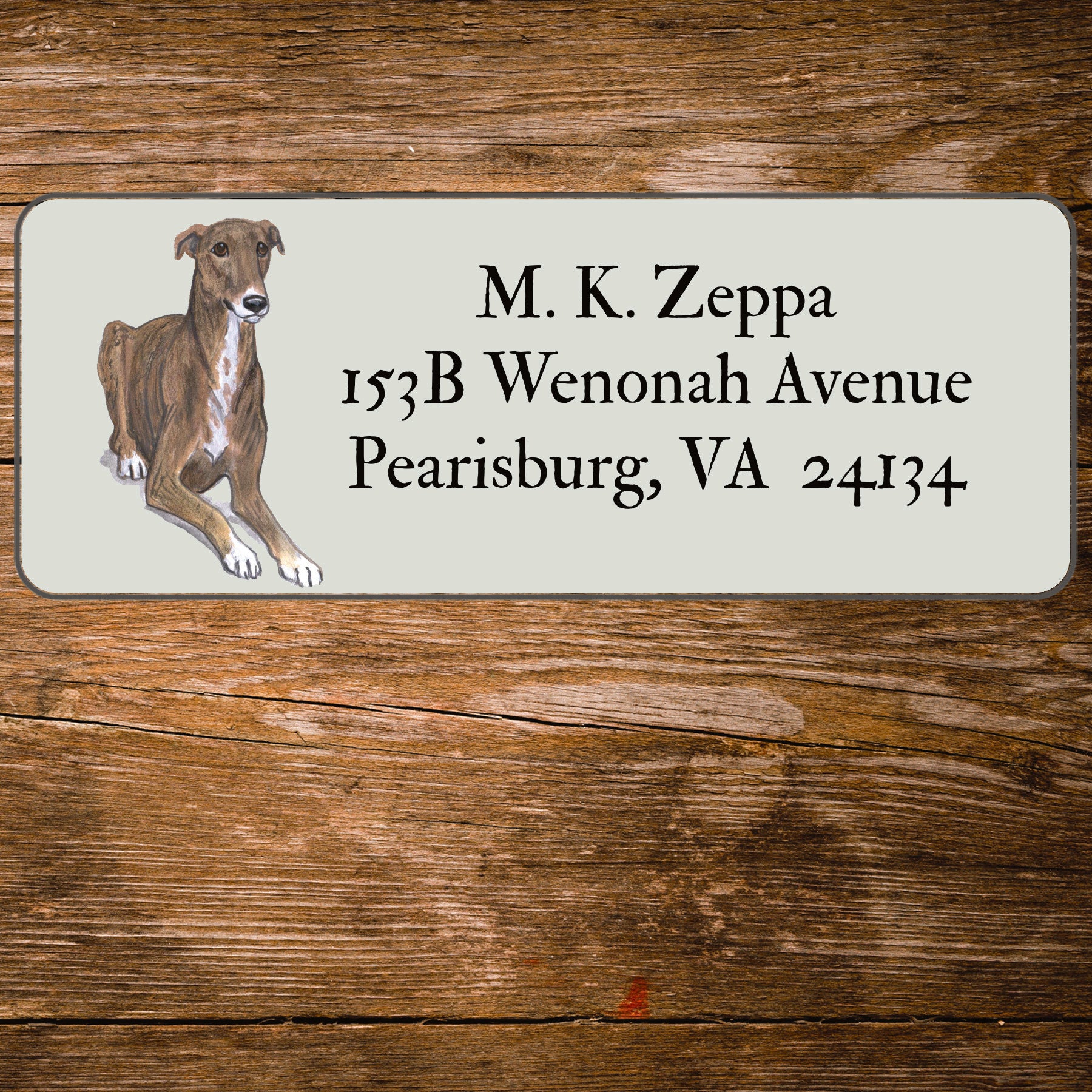 Return address label with a Greyhound illustration.