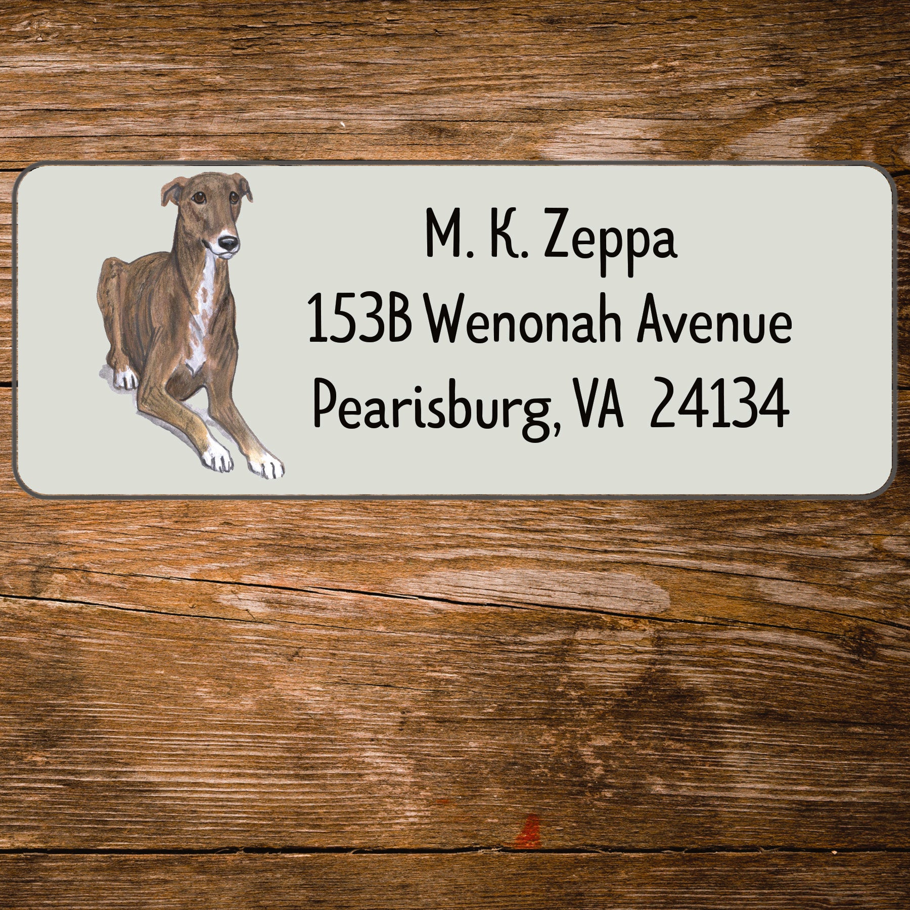 Return address label with a Greyhound illustration.
