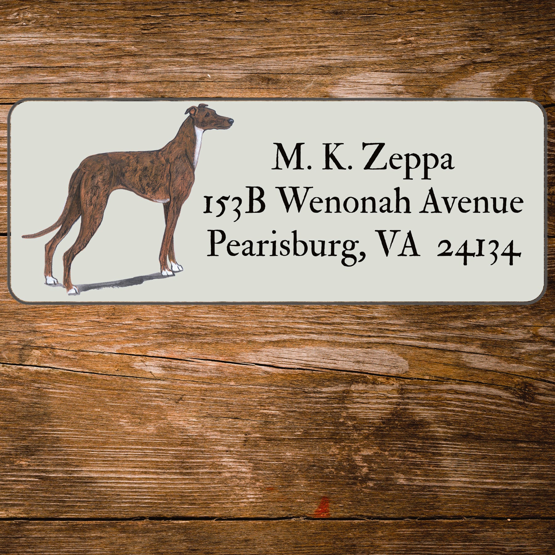 Return address label with a Greyhound illustration.