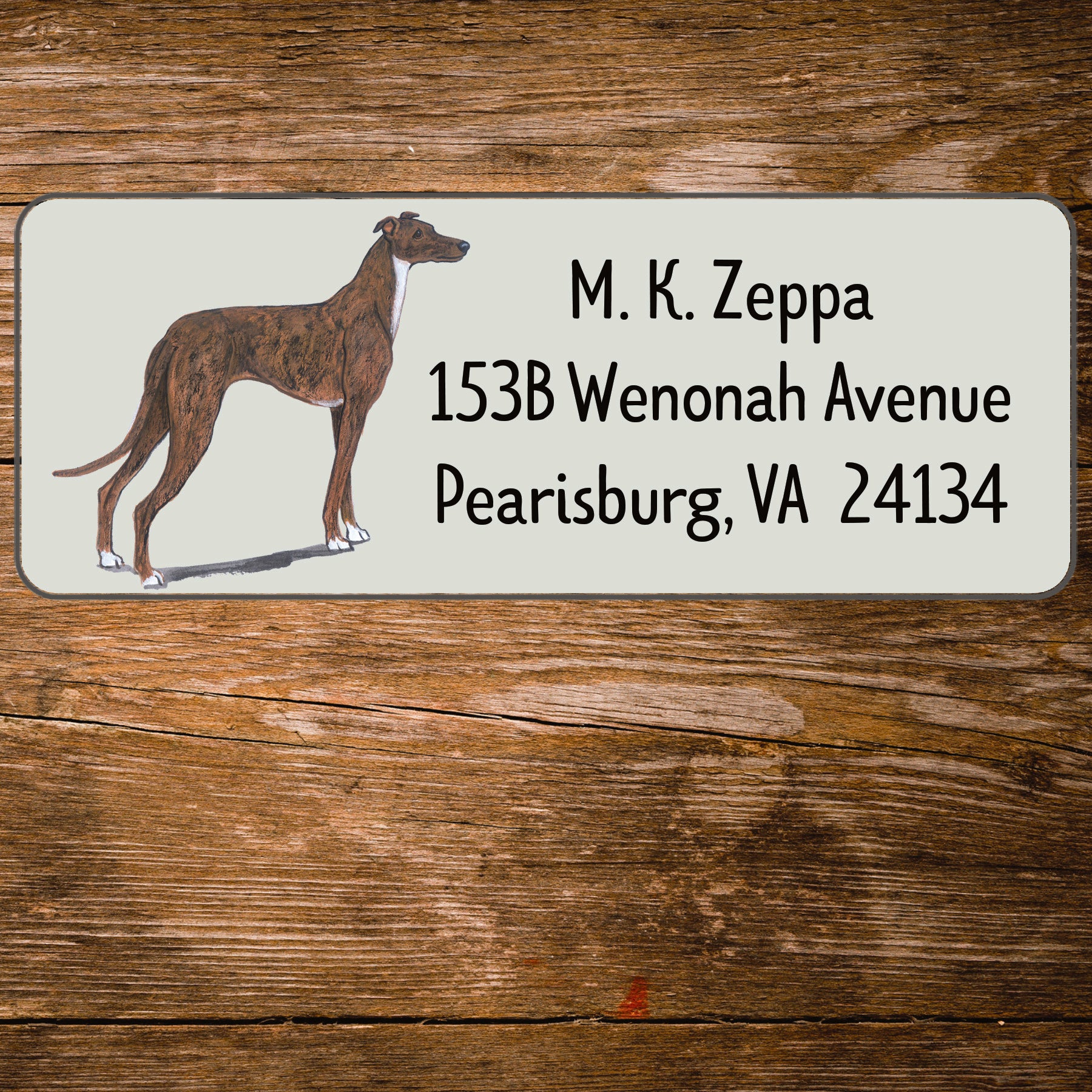 Return address label with a Greyhound illustration.