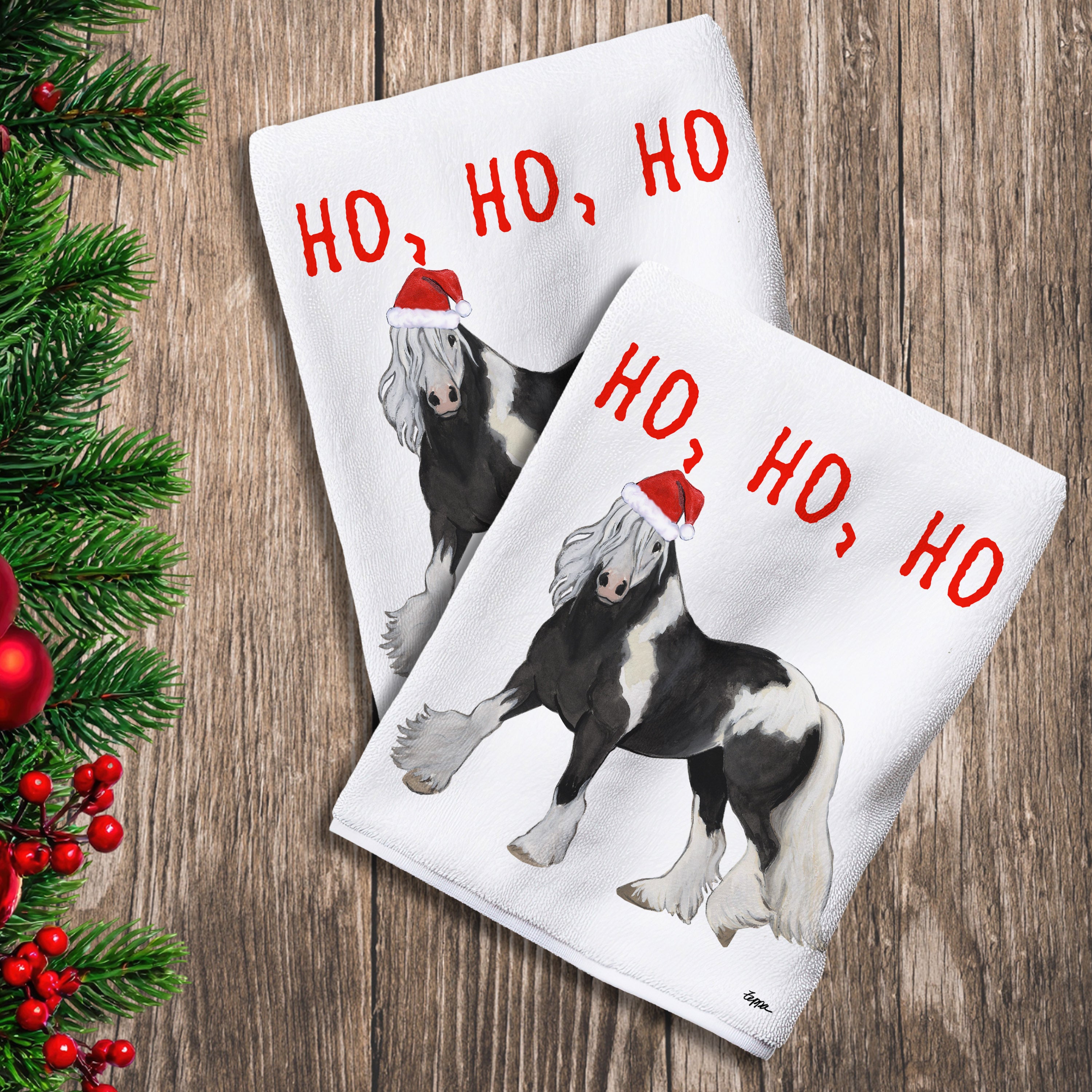 2 Kitchen Towels with a Gypsy Vanner horse in a Santa Hat and Ho Ho Ho text.
