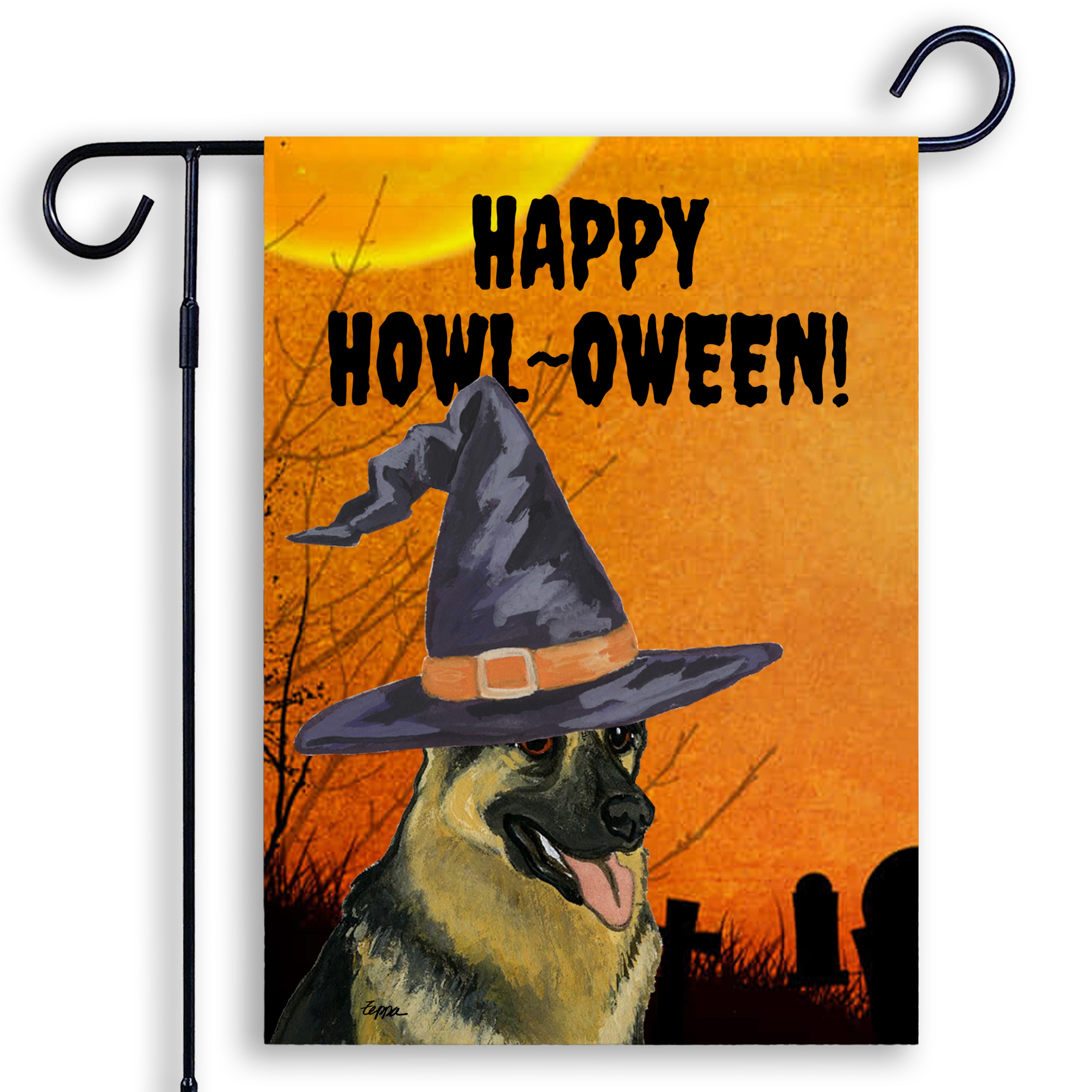 Halloween-themed garden flag with a German Shepherd wearing a witch hat and 'Happy Howl-Oween!' text on an orange background.