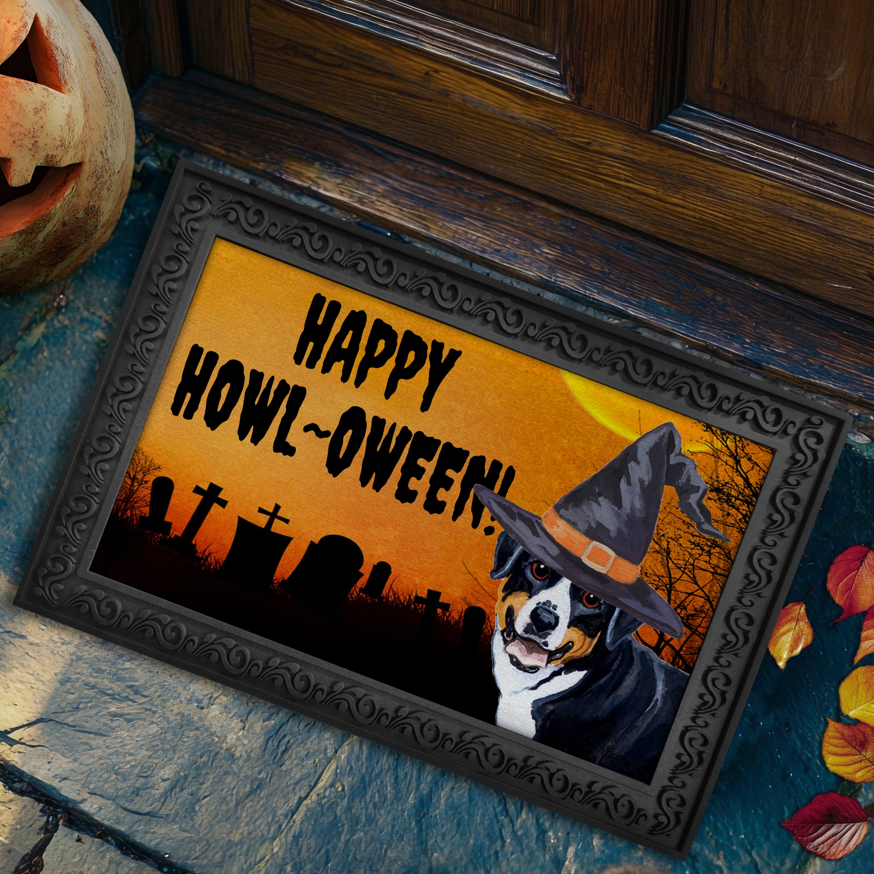 Halloween-themed doormat with a Greater Swiss Mountain Dog wearing a witch hat and 'Happy Howl-Oween!' text, placed on a stone surface.