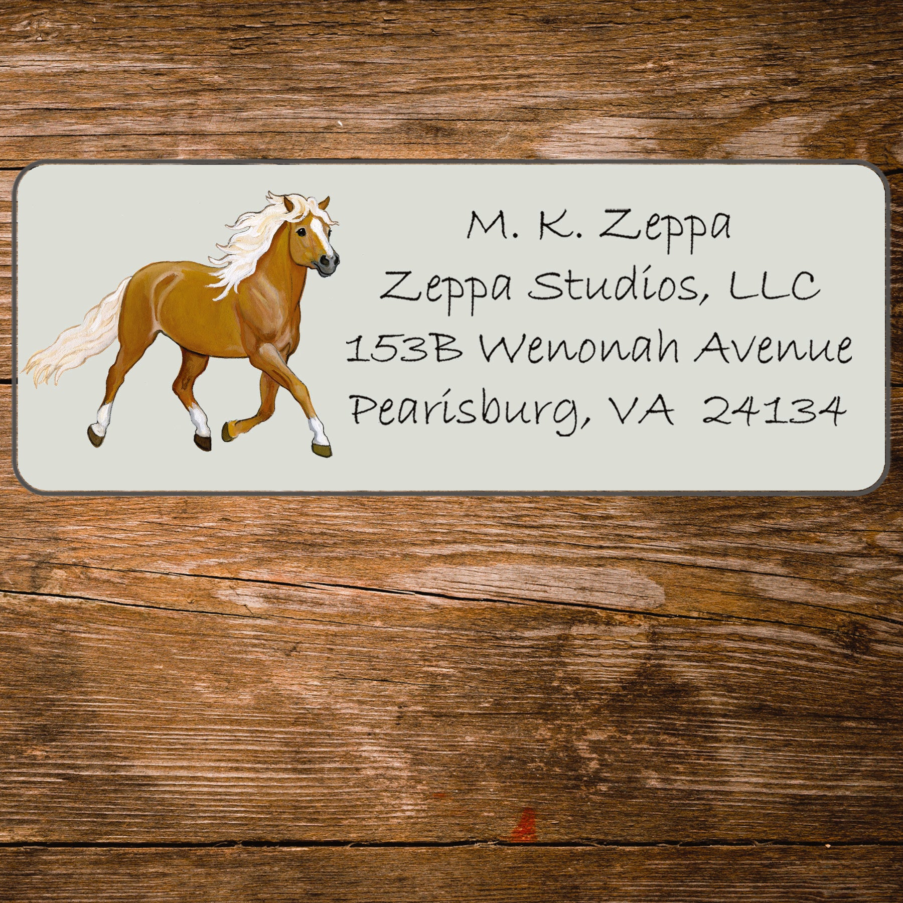 Return address label with an illustration of a Haflinger Horse.