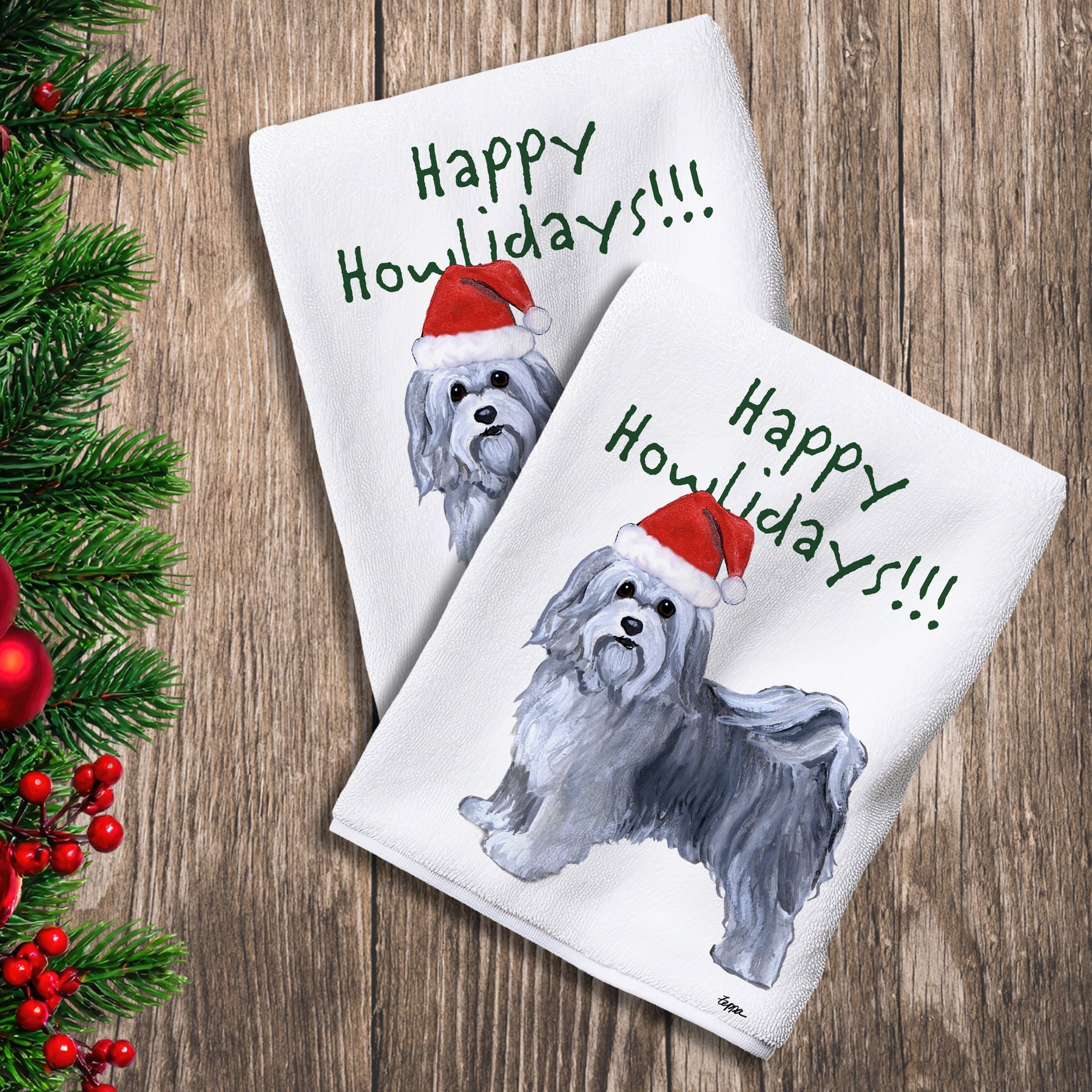 2 Kitchen Towels with a Havanese in a Santa Hat and Happy Howlidays text.