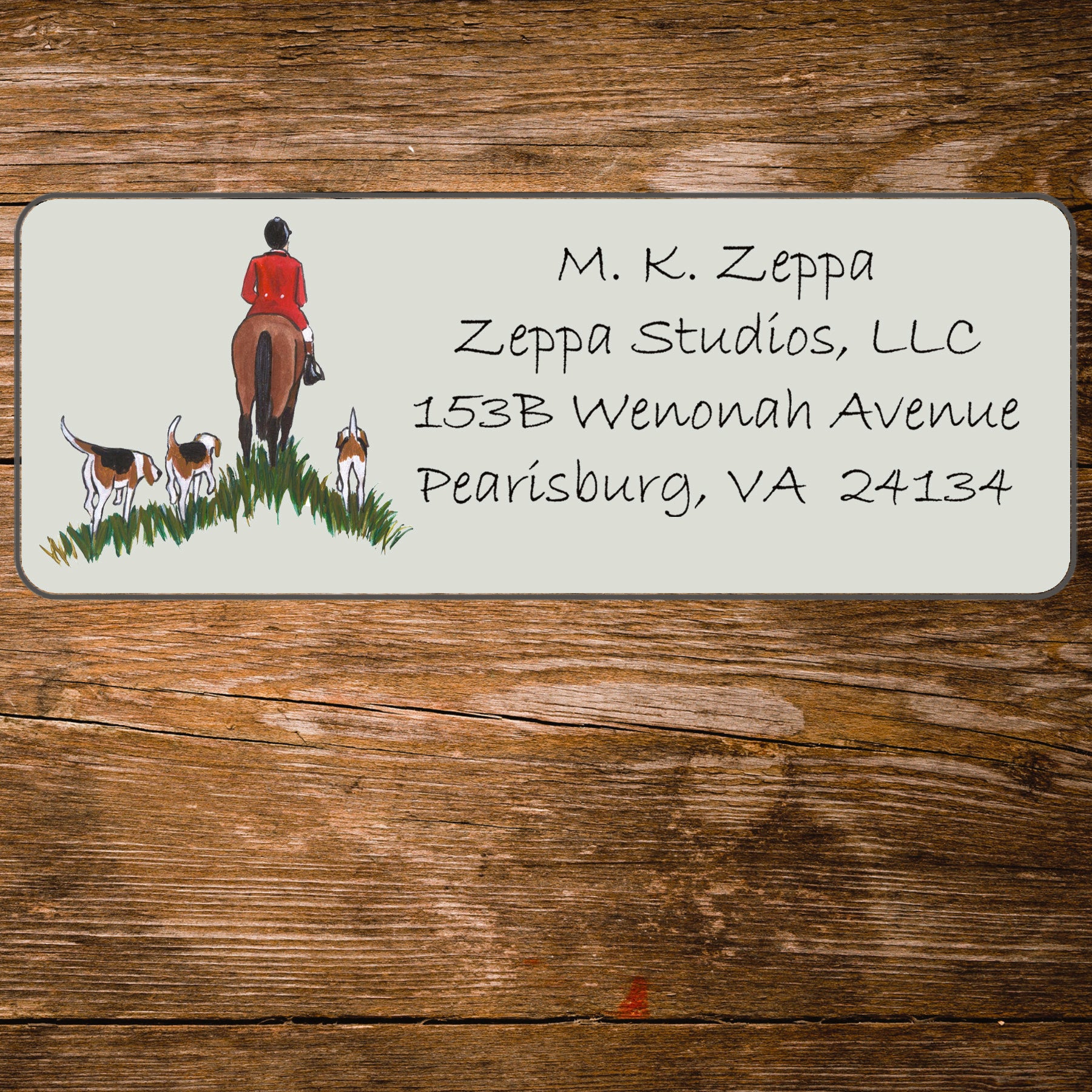 Address label with a fox hunting scene illustration on a wooden background